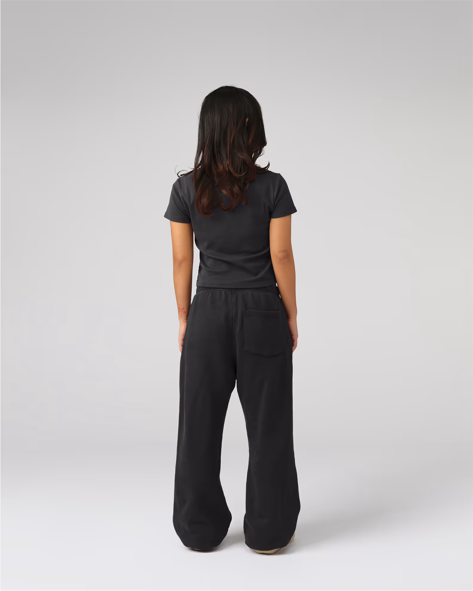 A modern silhouette with a shorter, more fitted profile with cap sleeves for contemporary styling. Crafted from premium organic cotton 1x1 rib for exceptional stretch, recovery, and a luxurious feel against the skin.