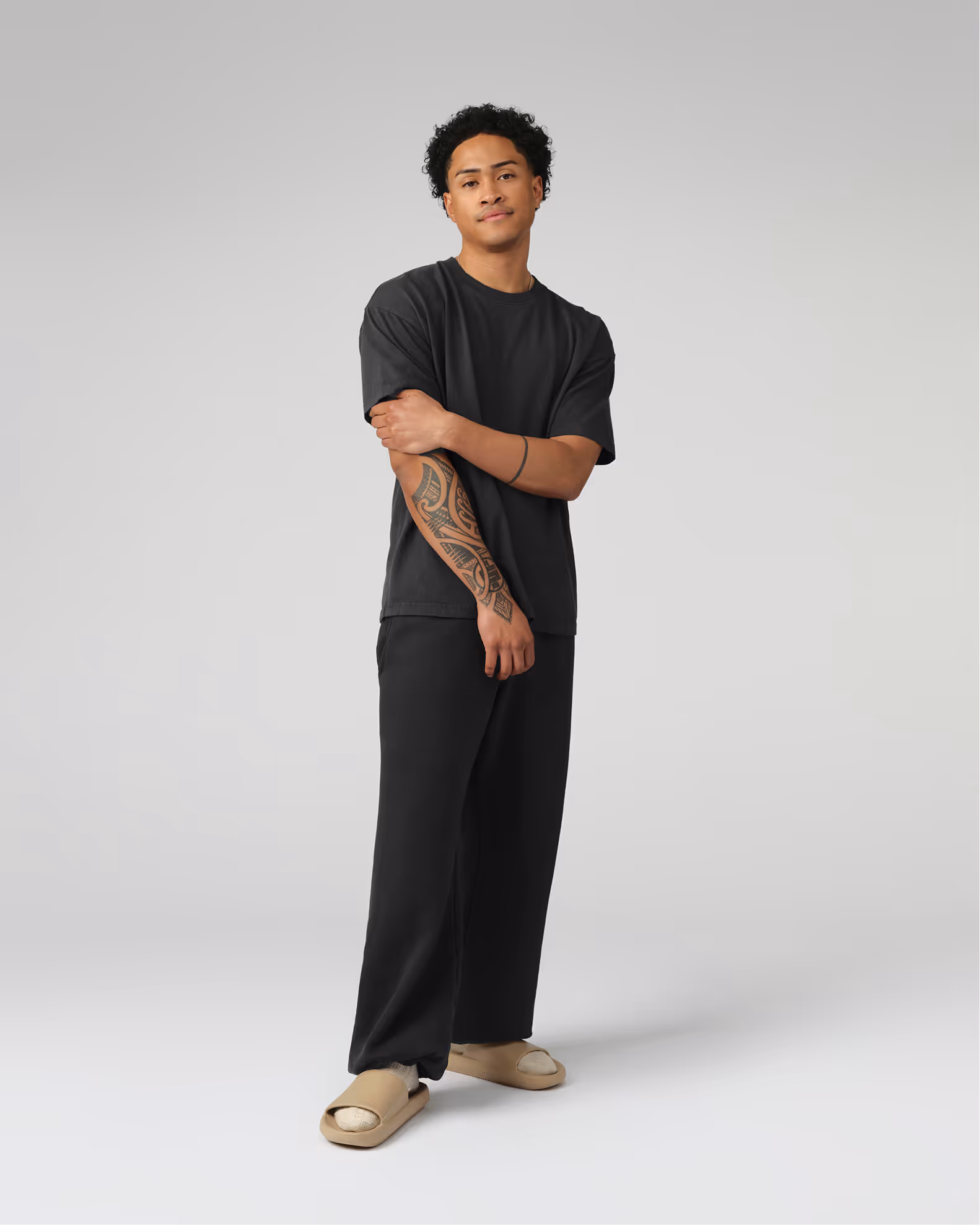 A contemporary streetwear silhouette with wider proportions for distinctive presence. Created from our proprietary BioCircular™ Jersey fabric, blending recycled and organic cotton for minimized impact.