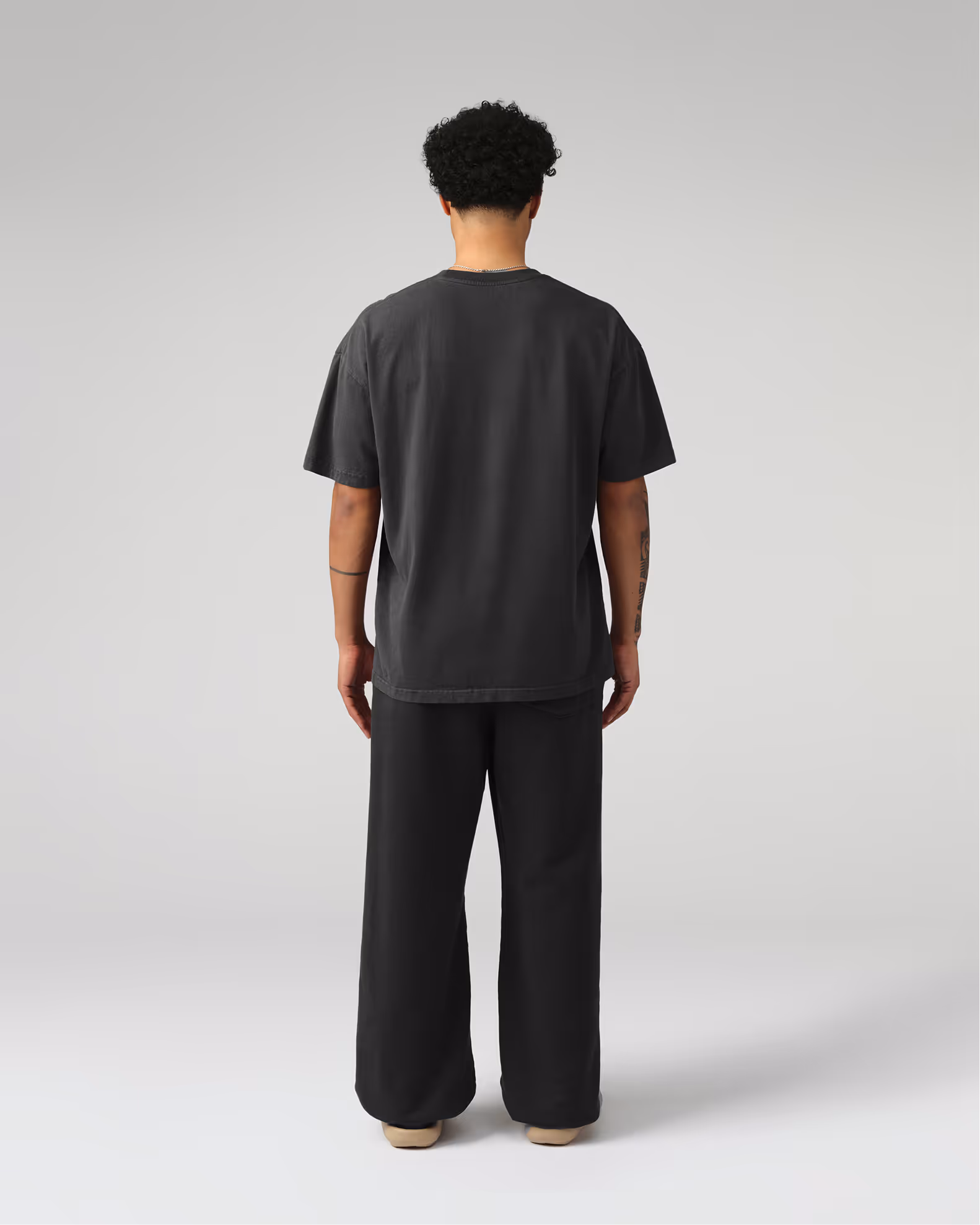 A contemporary streetwear silhouette with wider proportions for distinctive presence. Created from our proprietary BioCircular™ Jersey fabric, blending recycled and organic cotton for minimized impact.