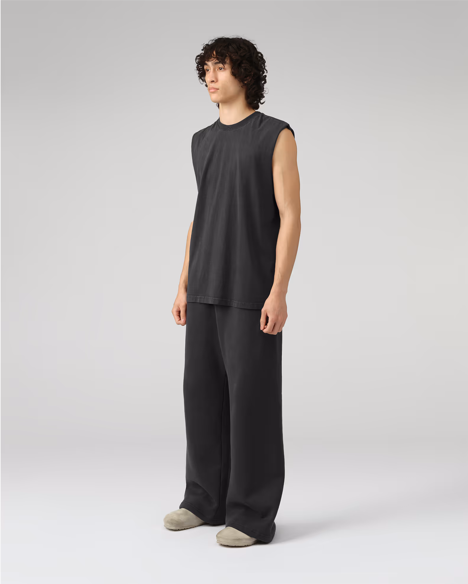 A sleeveless interpretation of our classic silhouette for a bold, versatile look. Created from our proprietary BioCircular™ Jersey fabric crafted from recycled and organic cotton for minimized impact.