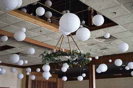 White lanterns at Sandusky Yacht Club on the ceiling. 