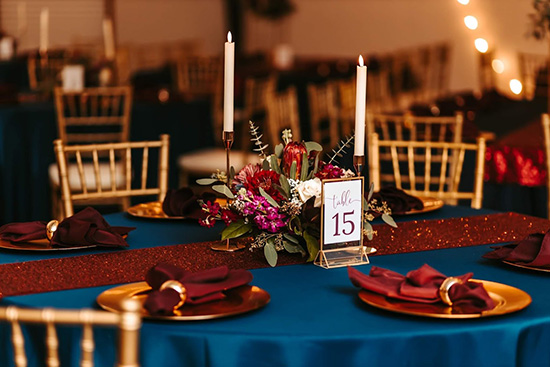 Flowers and two taper candles.