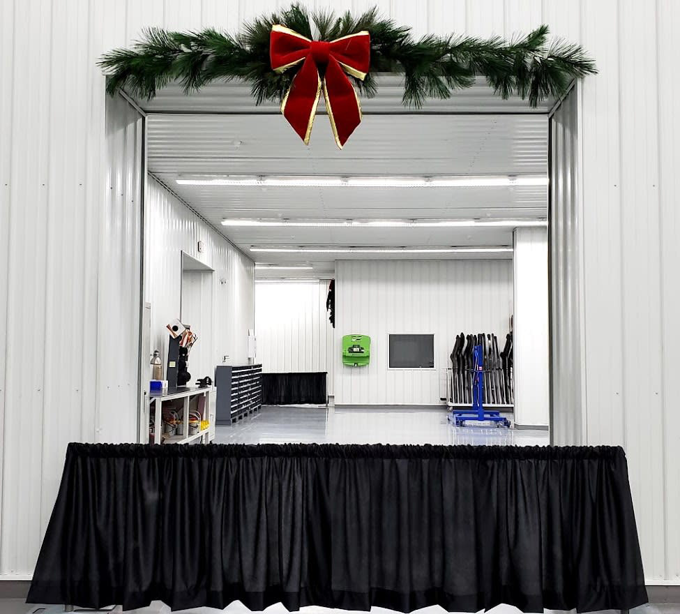 Mini wall draping for blocking off areas without blocking the view. 