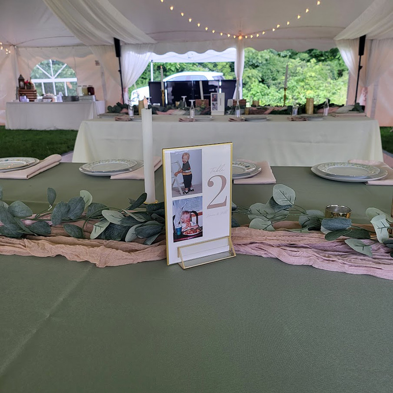 Wedding table number idea where there is a memory and image of Groom on table number 2.