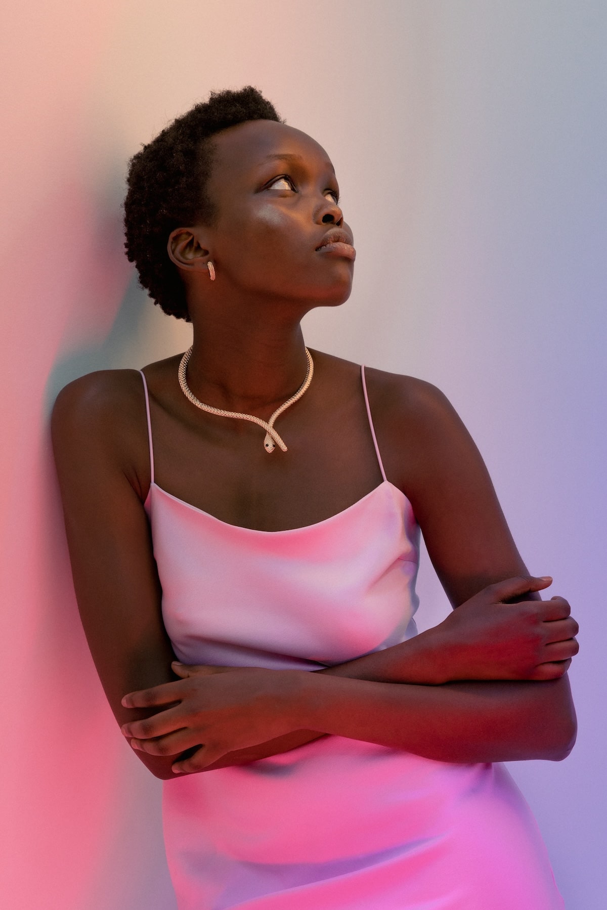 Lifestyle photo of model with beauty product in studio
