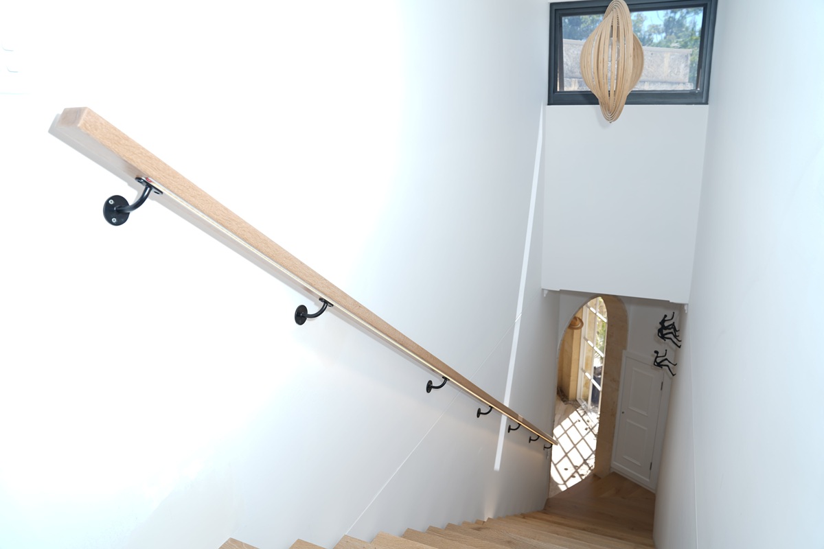 Timber wall-mounted handrail