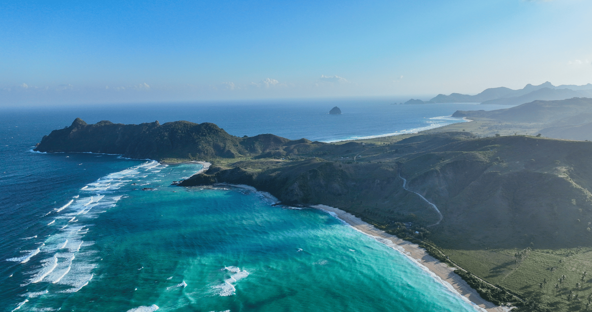 Sunset over Lombok’s southern coastline, symbolizing Indonesia’s tourism revival in 2025