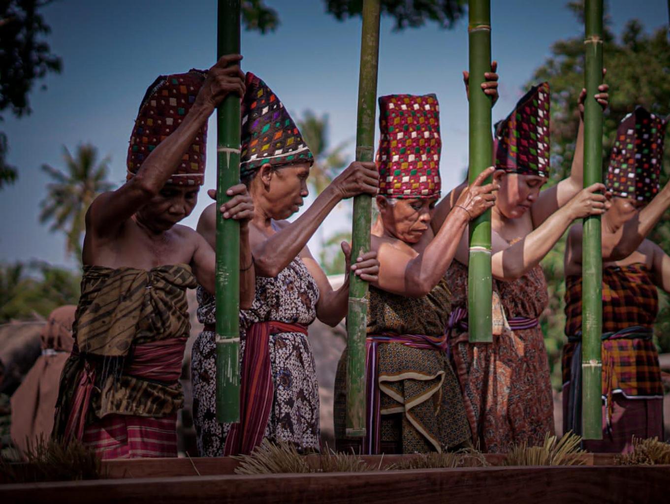 Traditional Sasak village in Lombok surrounded by green hills