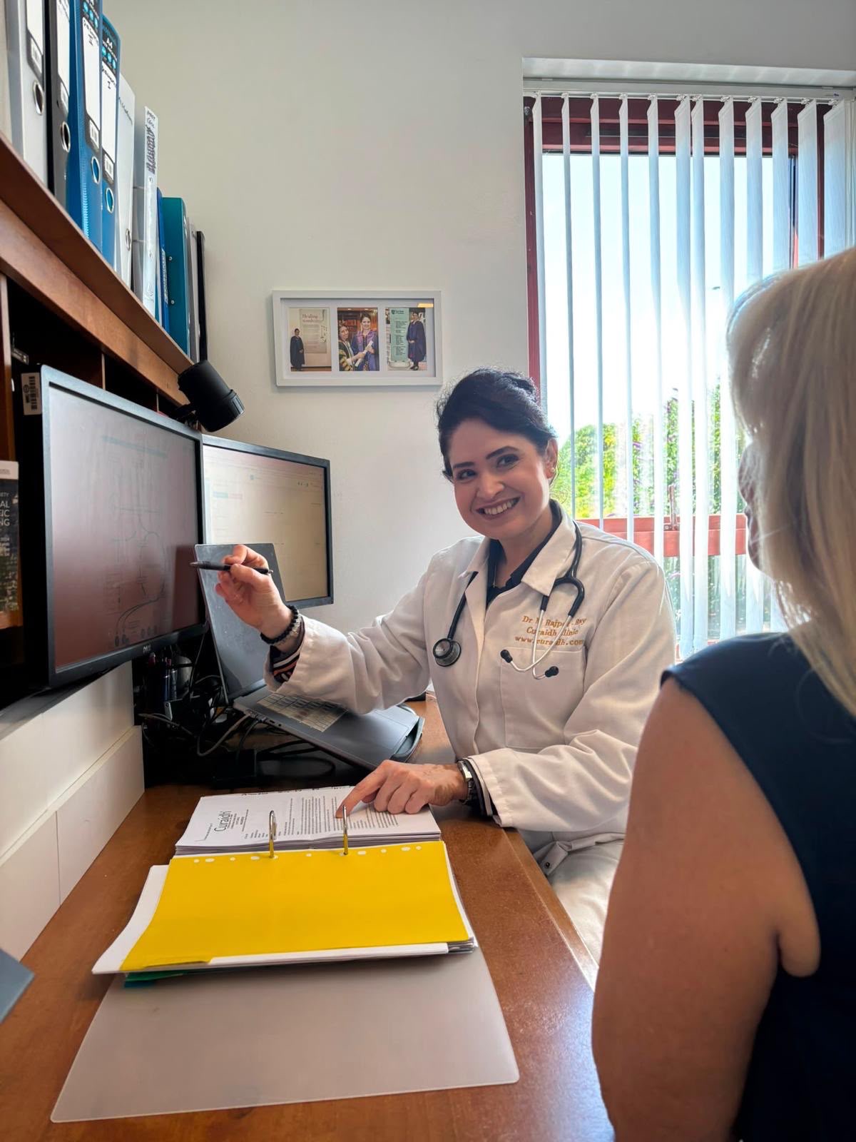 Dr Minha Rajput-Ray in consultation with a patient at Curaidh Clinic, Dundee