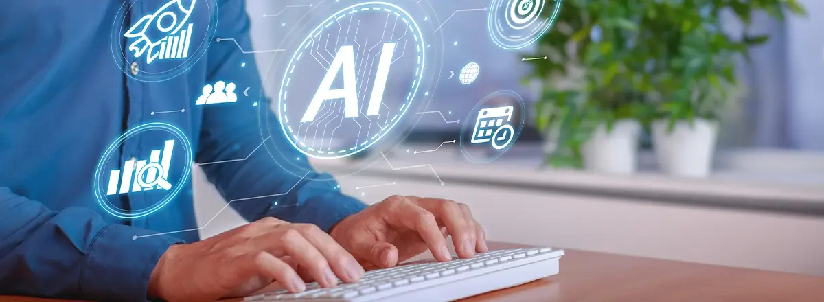 Hände auf Tastatur mit KI-Dashboard und digitalen Analyse-Icons im Büro