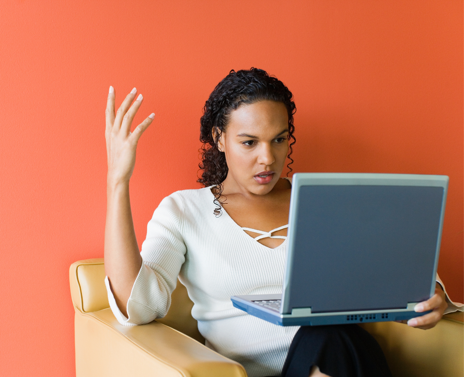 a frustrated web designer in front of a computer