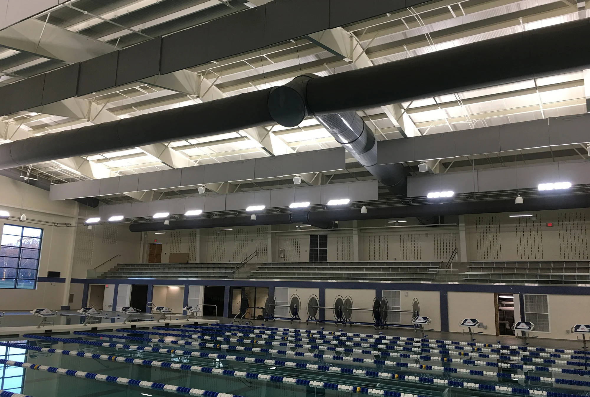A close-up of a large indoor swimming pool.