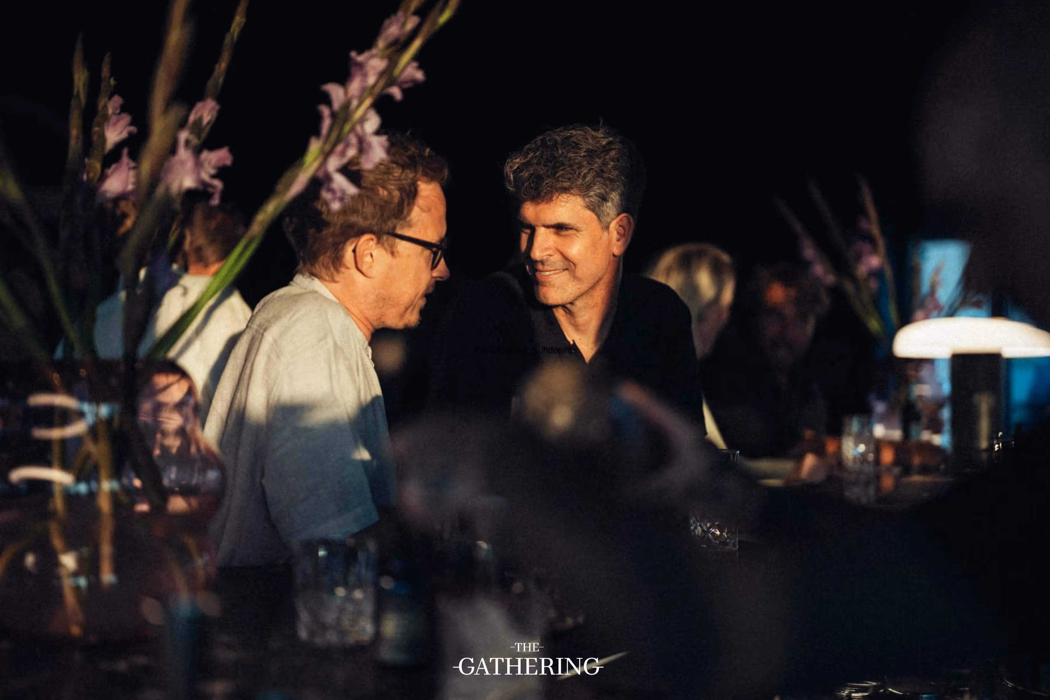 Crowd mingling with drinks at The Gathering hosted by Maison ACME