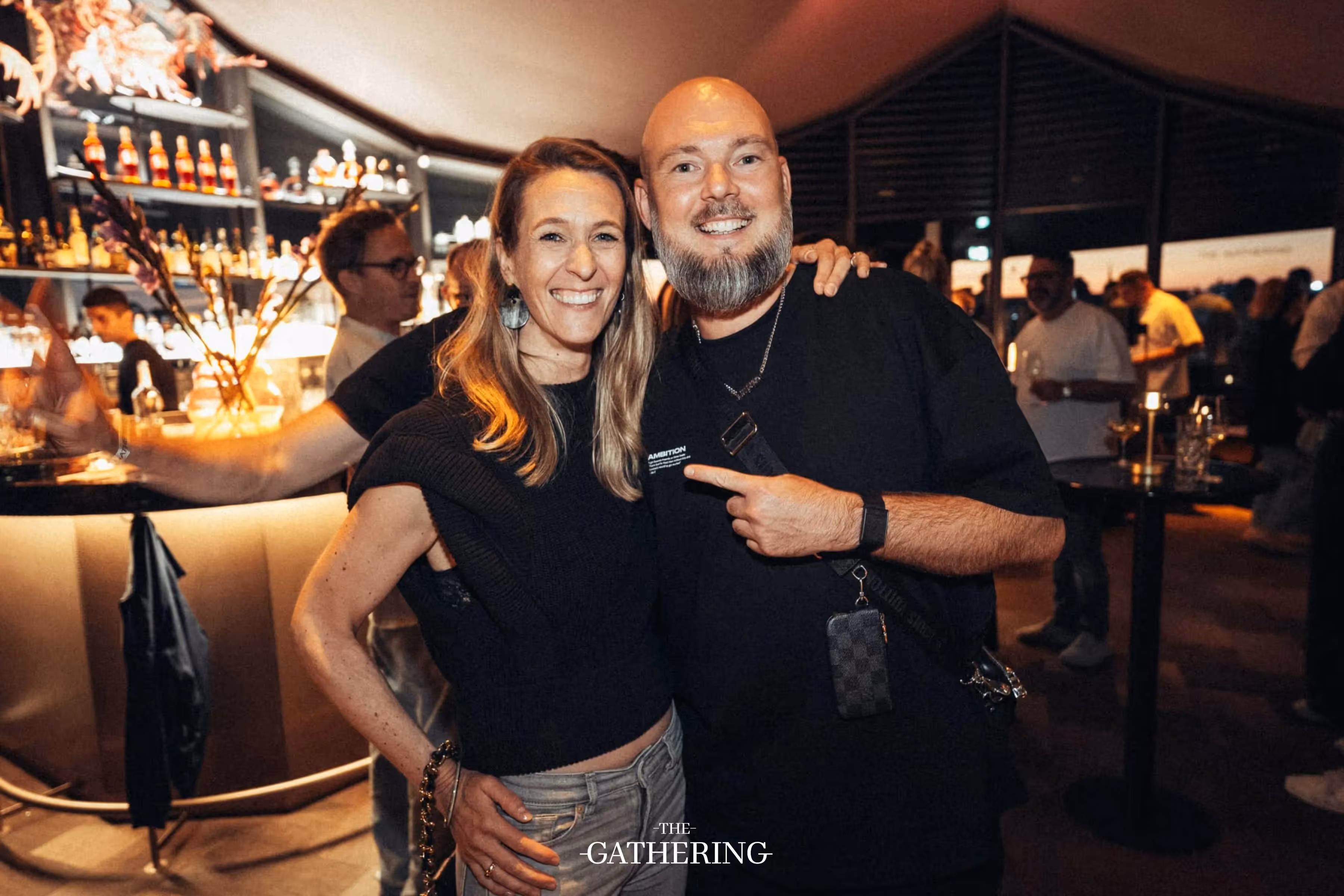 Crowd mingling with drinks at The Gathering hosted by Maison ACME