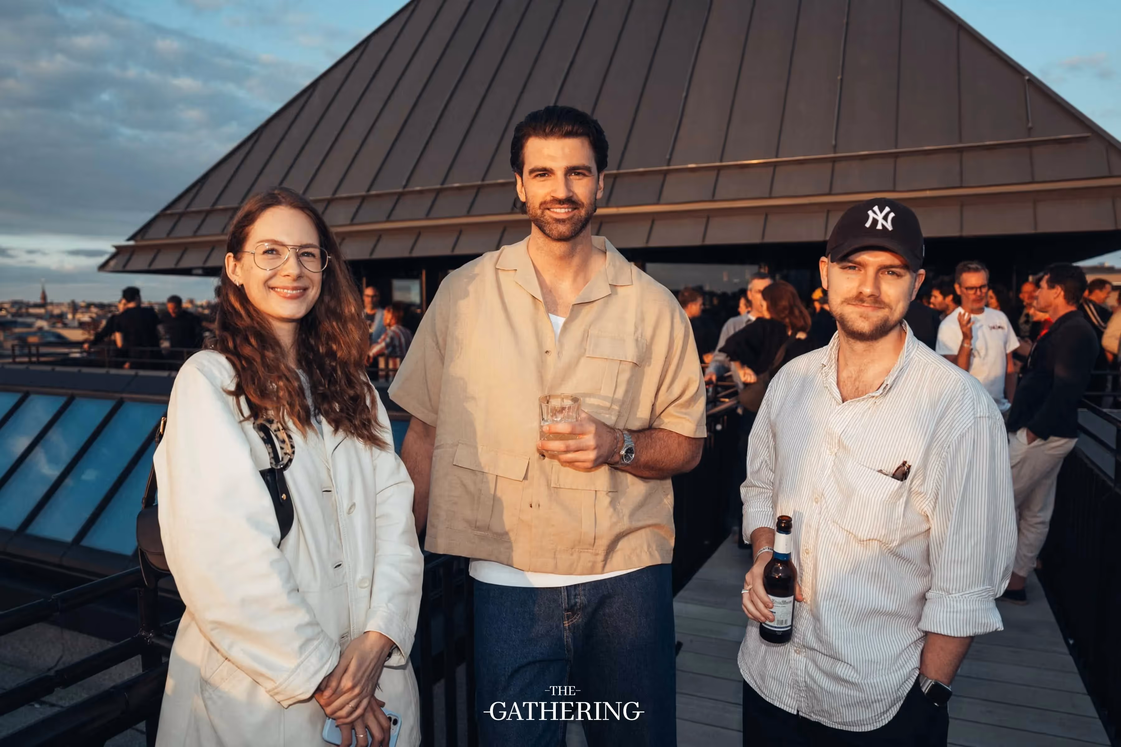 Crowd mingling with drinks at The Gathering hosted by Maison ACME