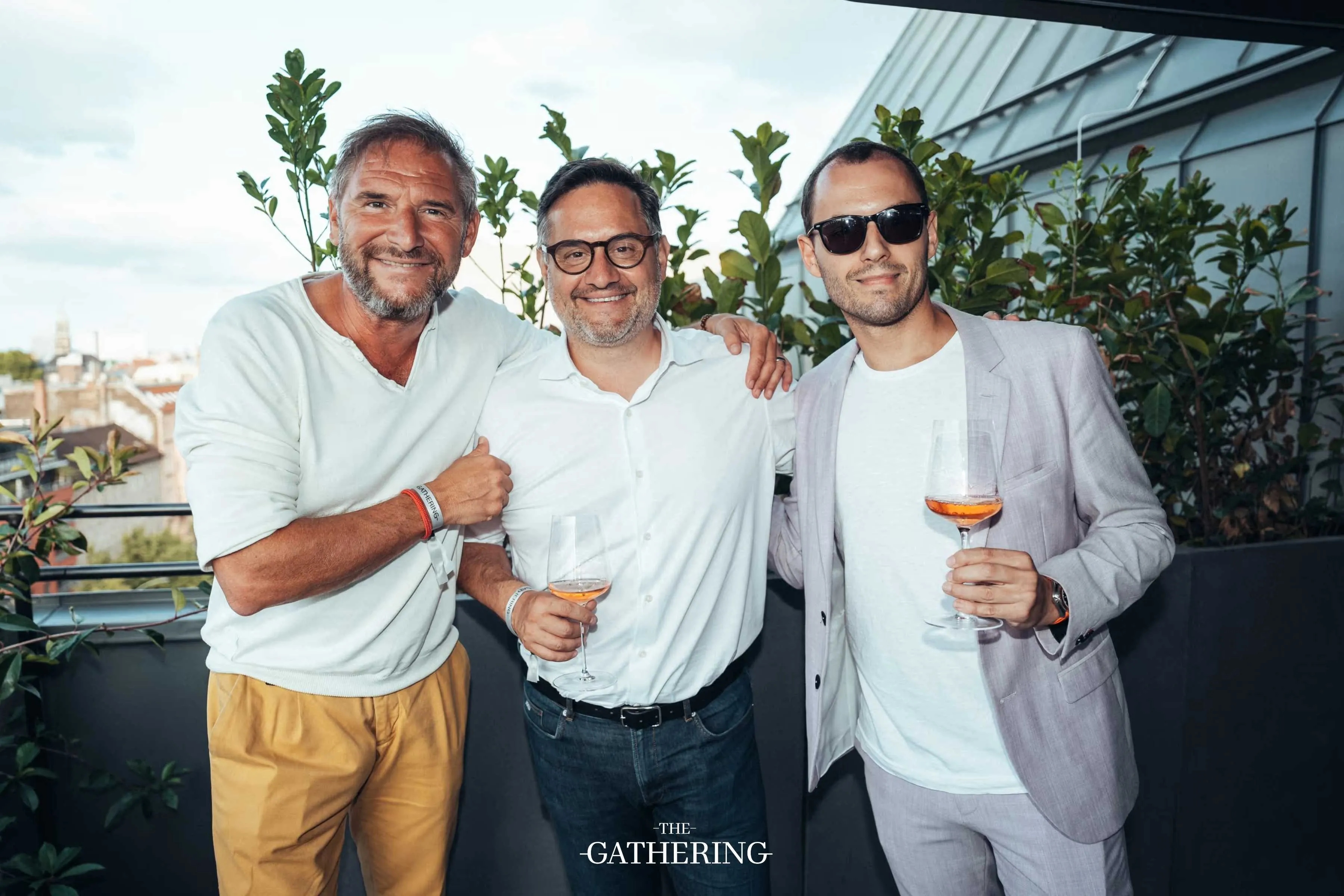 Crowd mingling with drinks at The Gathering hosted by Maison ACME