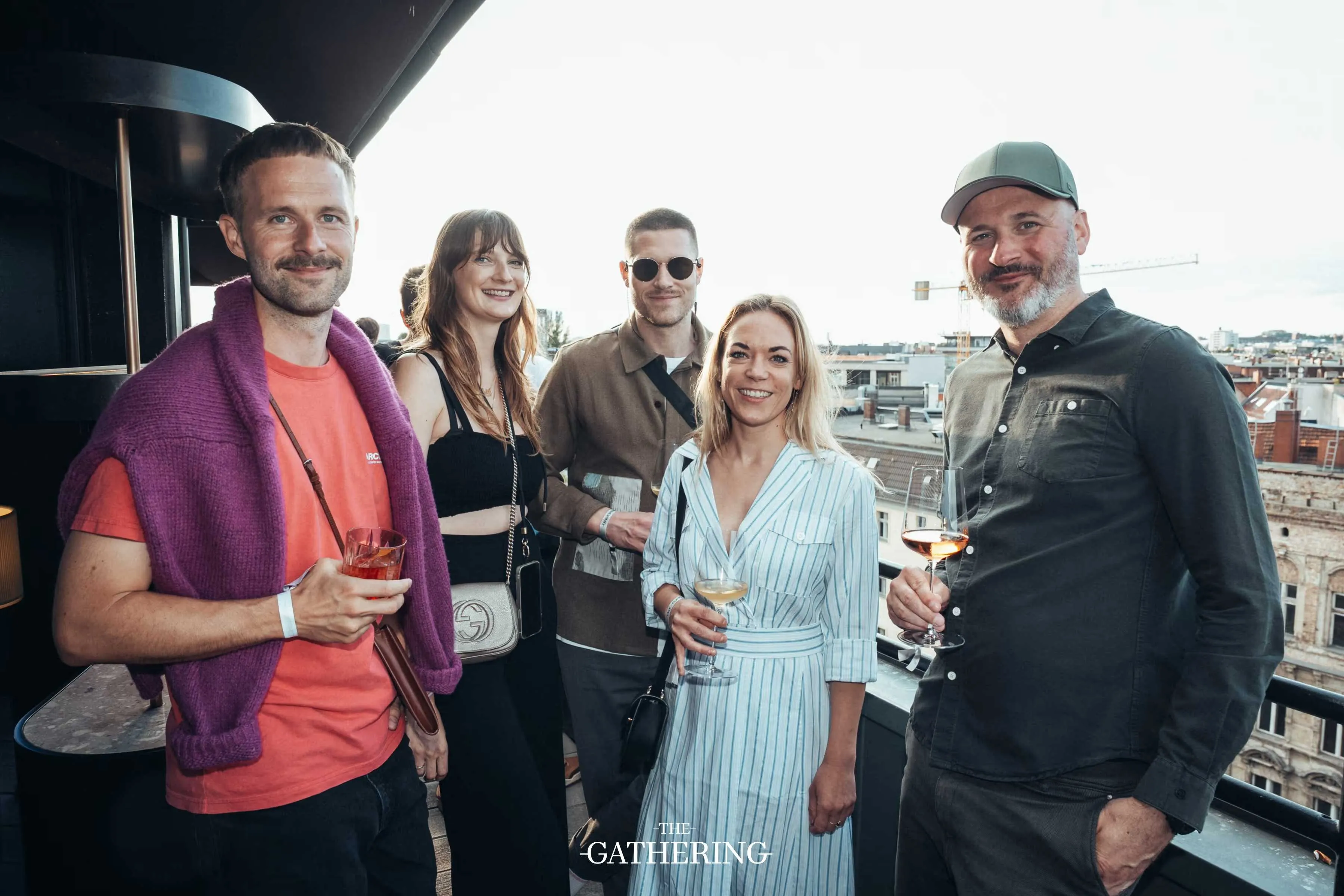 Crowd mingling with drinks at The Gathering hosted by Maison ACME