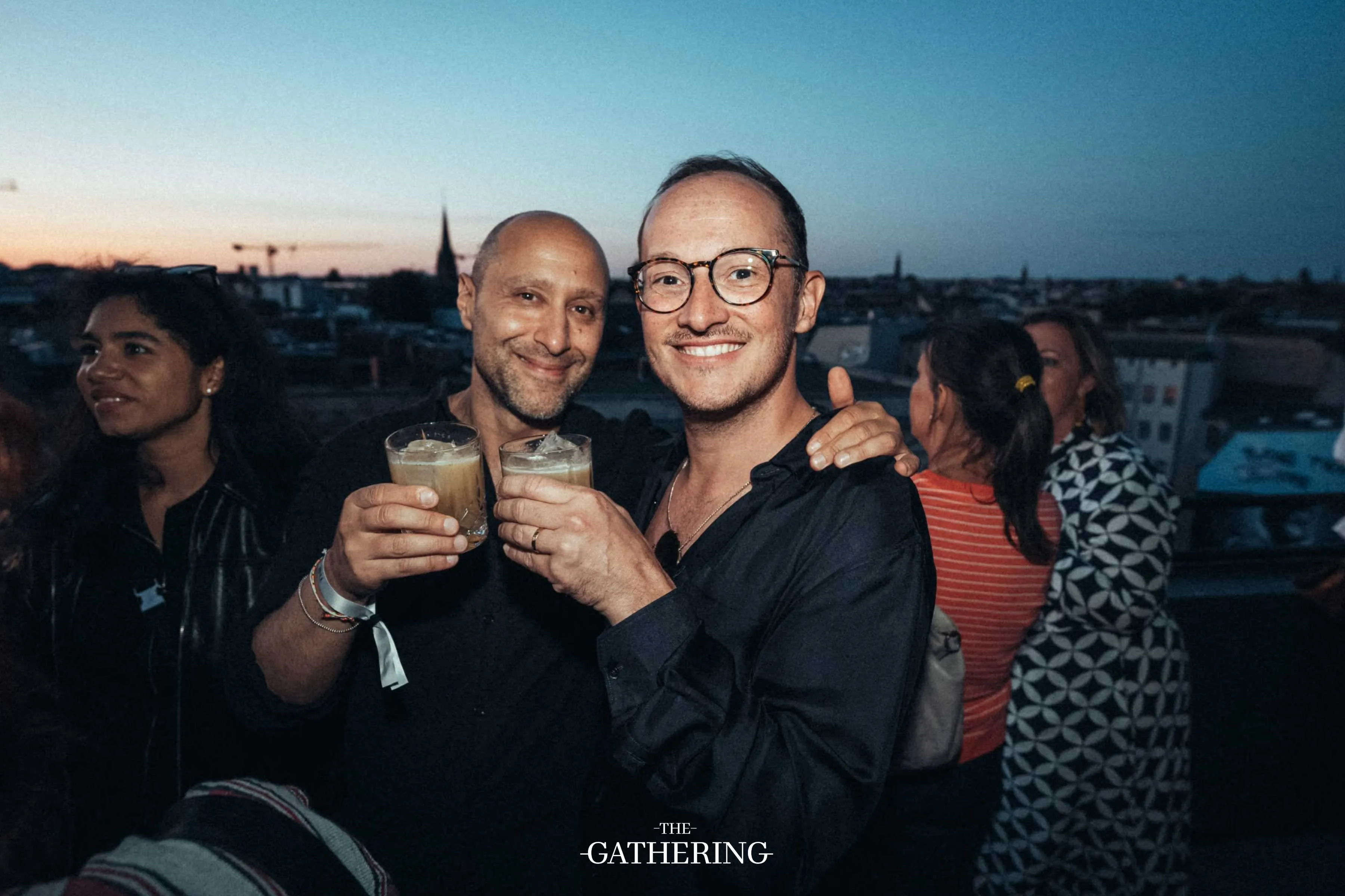 Crowd mingling with drinks at The Gathering hosted by Maison ACME
