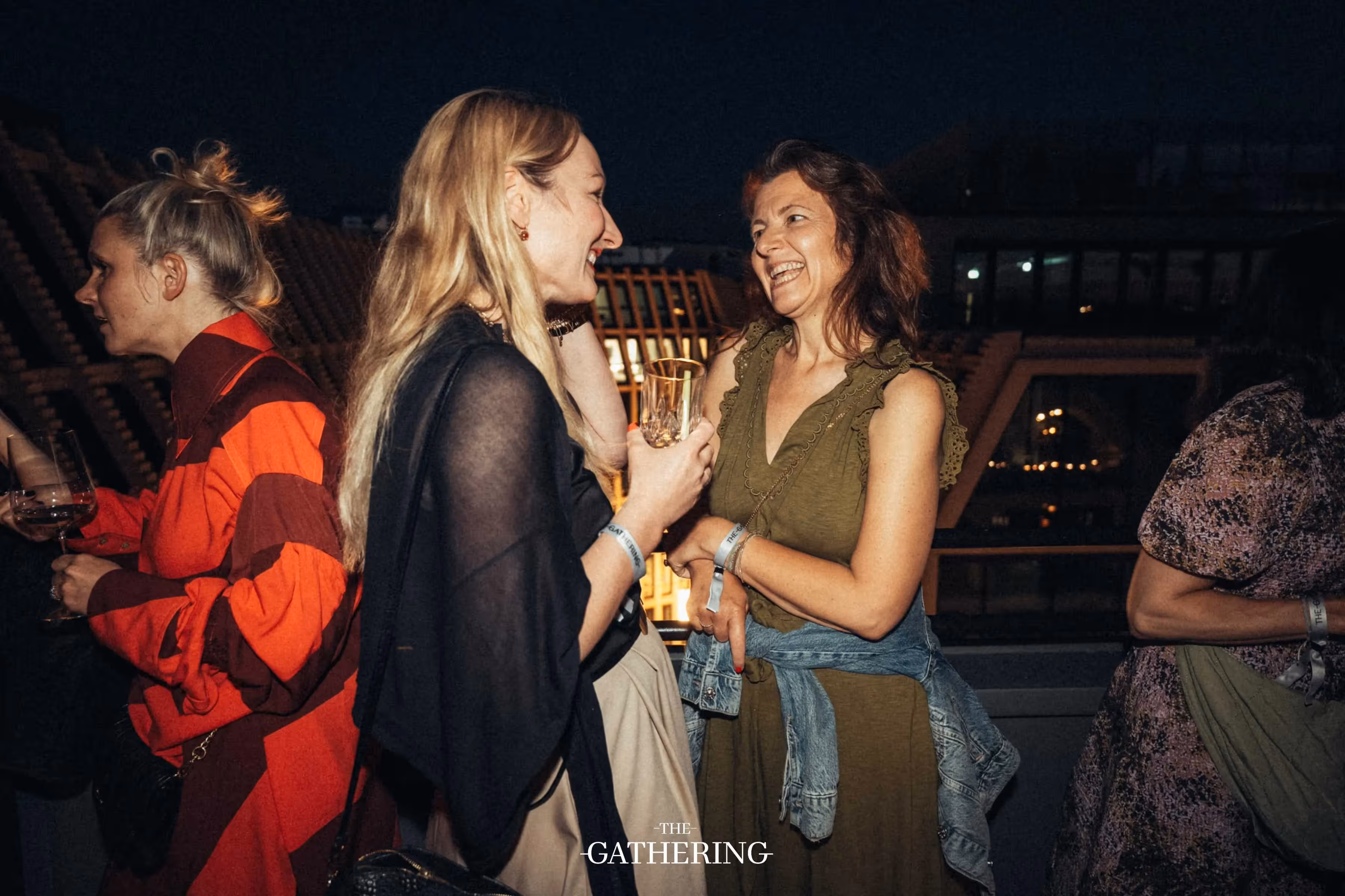Crowd mingling with drinks at The Gathering hosted by Maison ACME