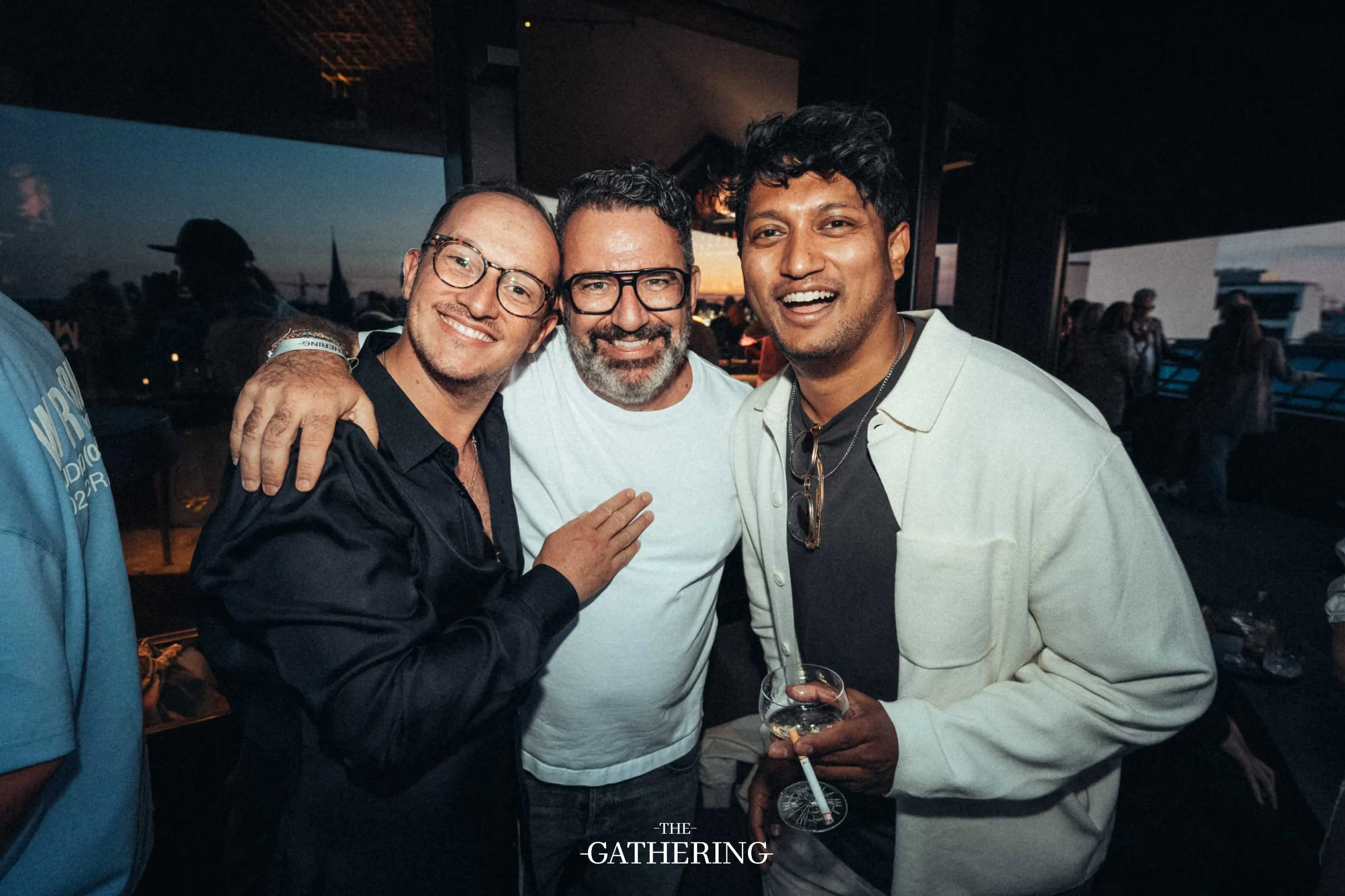 Crowd mingling with drinks at The Gathering hosted by Maison ACME
