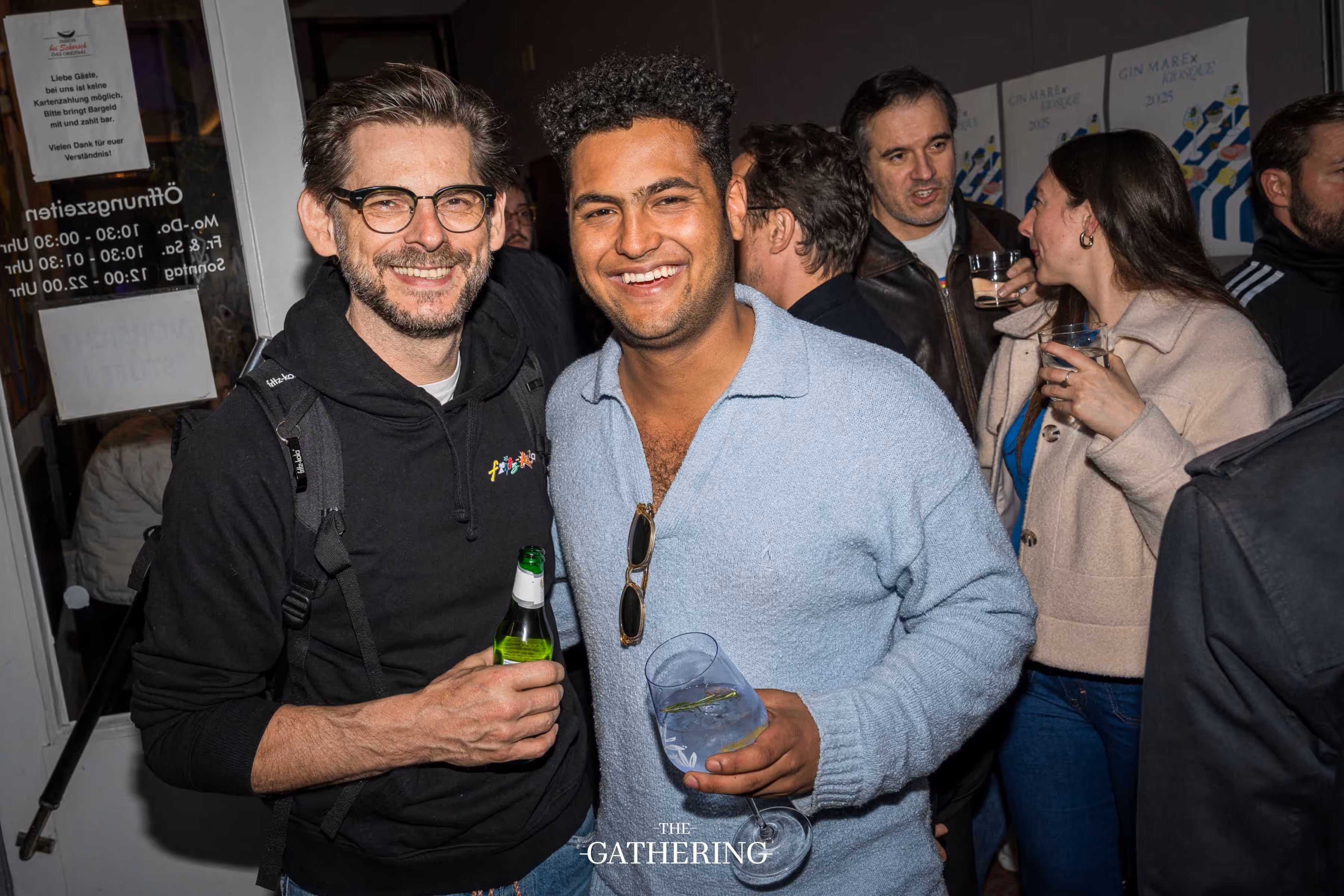 Crowd mingling with drinks at The Gathering hosted by Maison ACME
