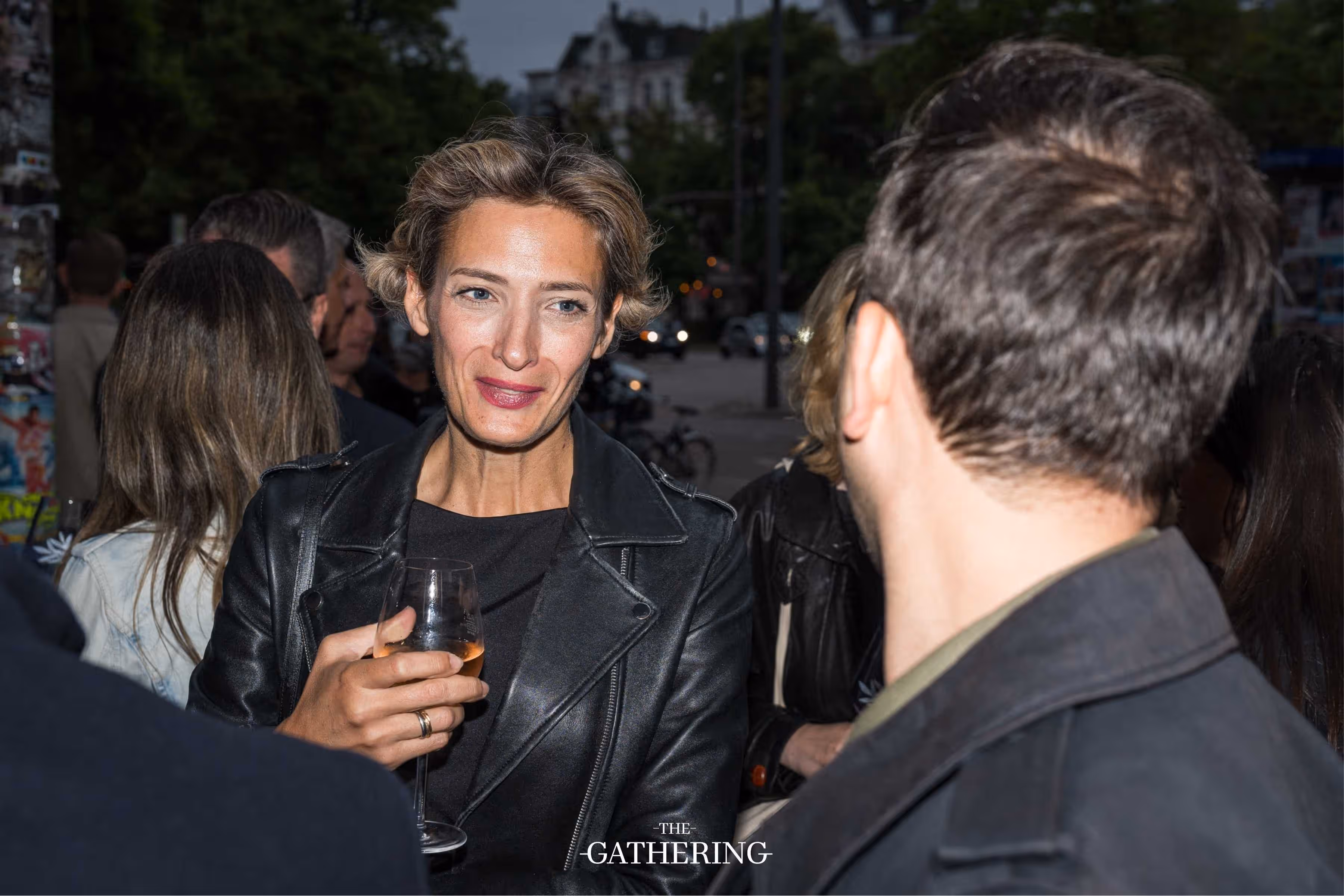Crowd mingling with drinks at The Gathering hosted by Maison ACME