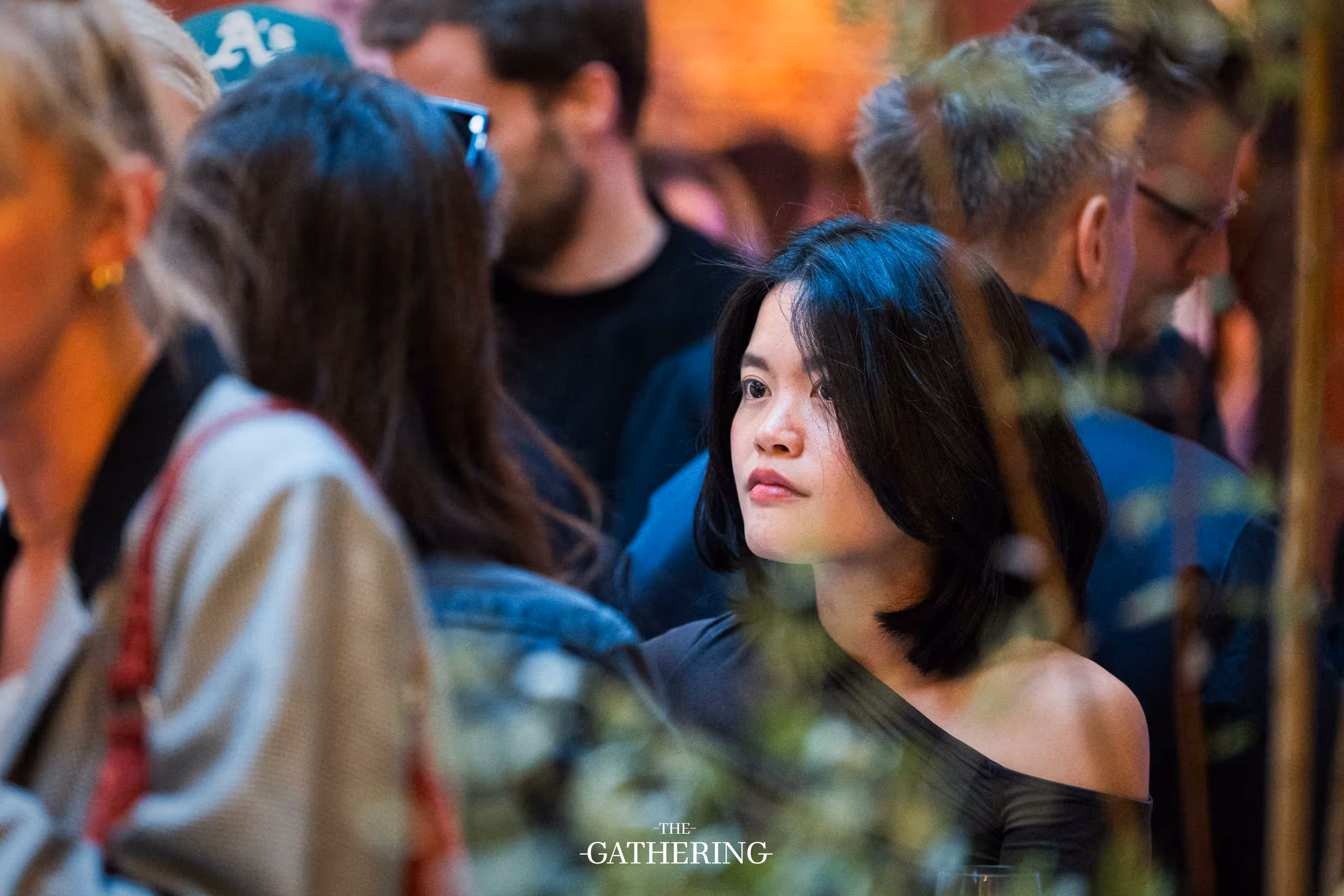 Crowd mingling with drinks at The Gathering hosted by Maison ACME