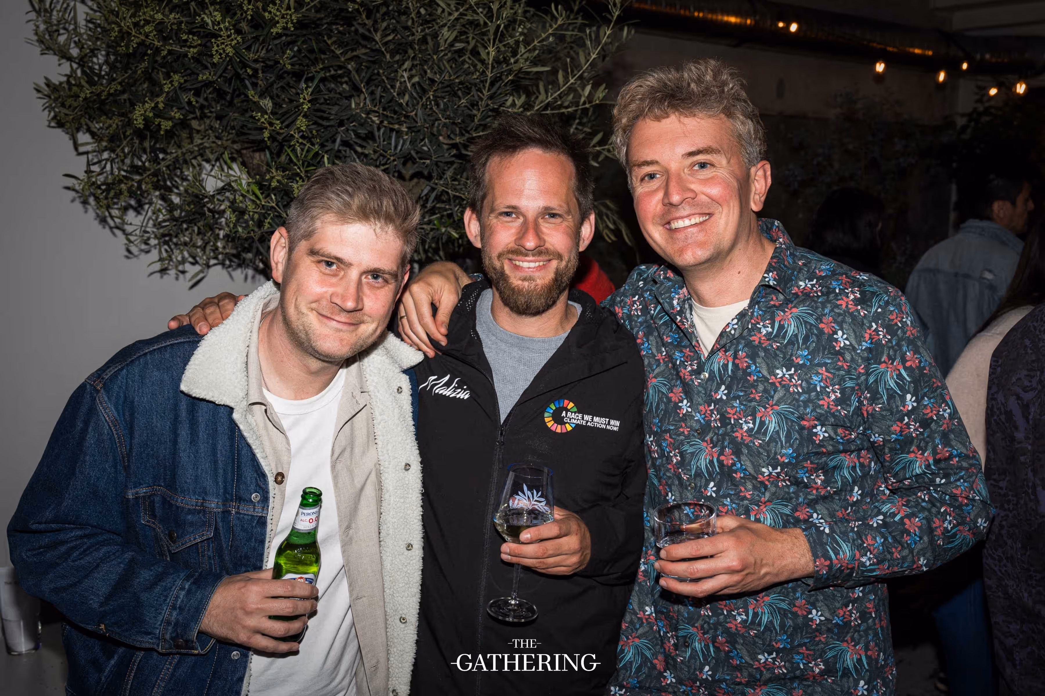 Crowd mingling with drinks at The Gathering hosted by Maison ACME