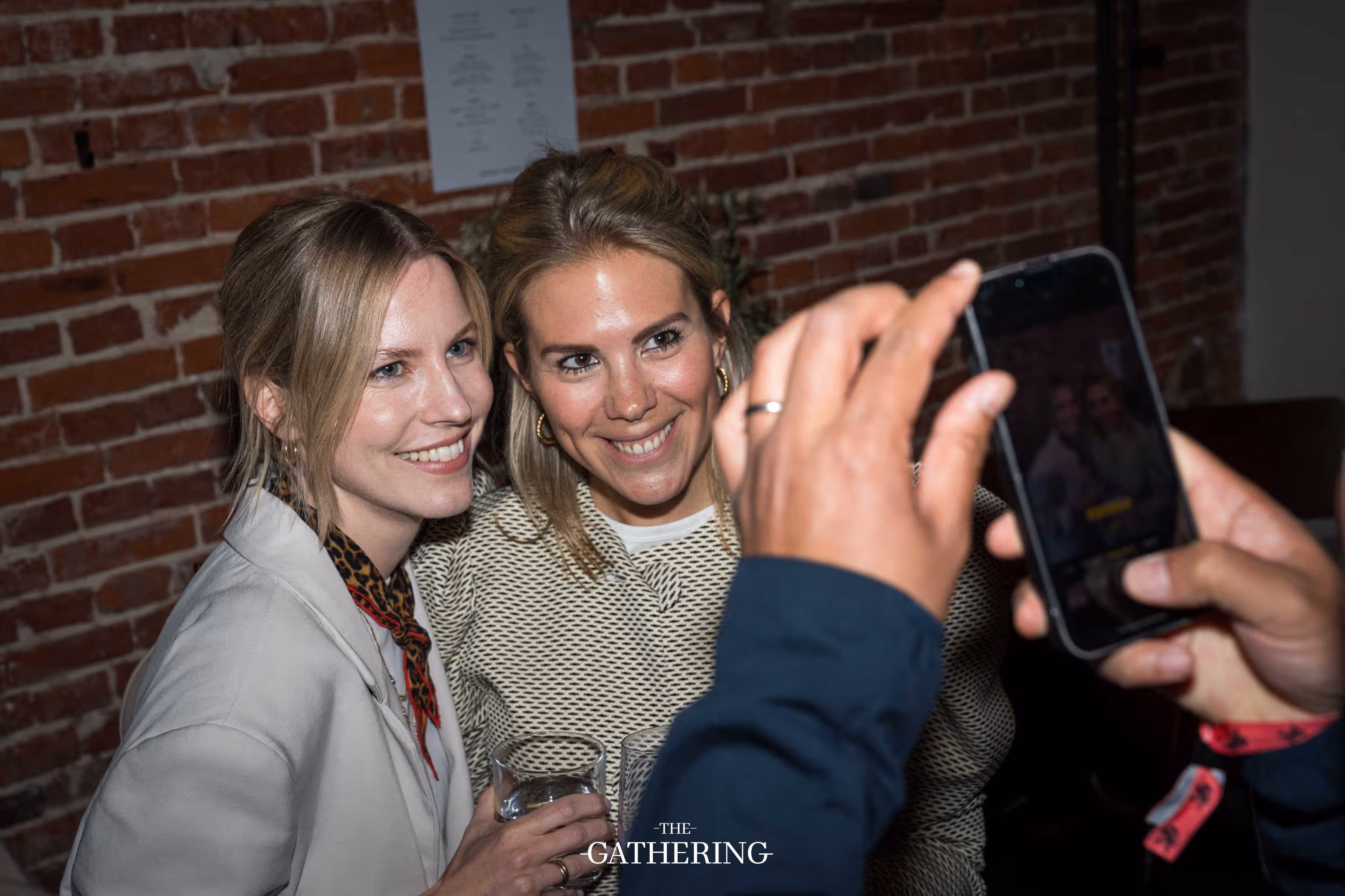 Crowd mingling with drinks at The Gathering hosted by Maison ACME