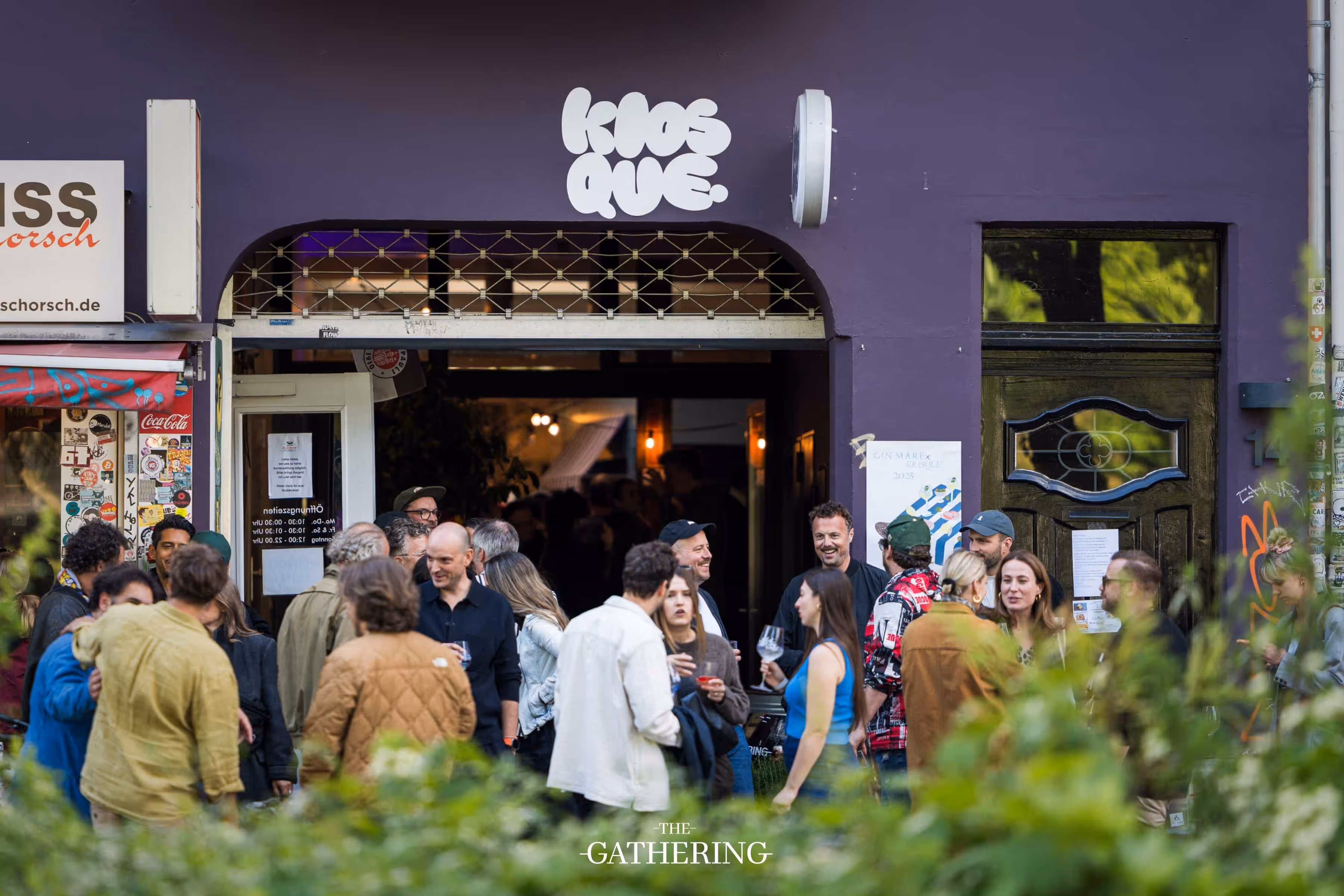 Crowd mingling with drinks at The Gathering hosted by Maison ACME