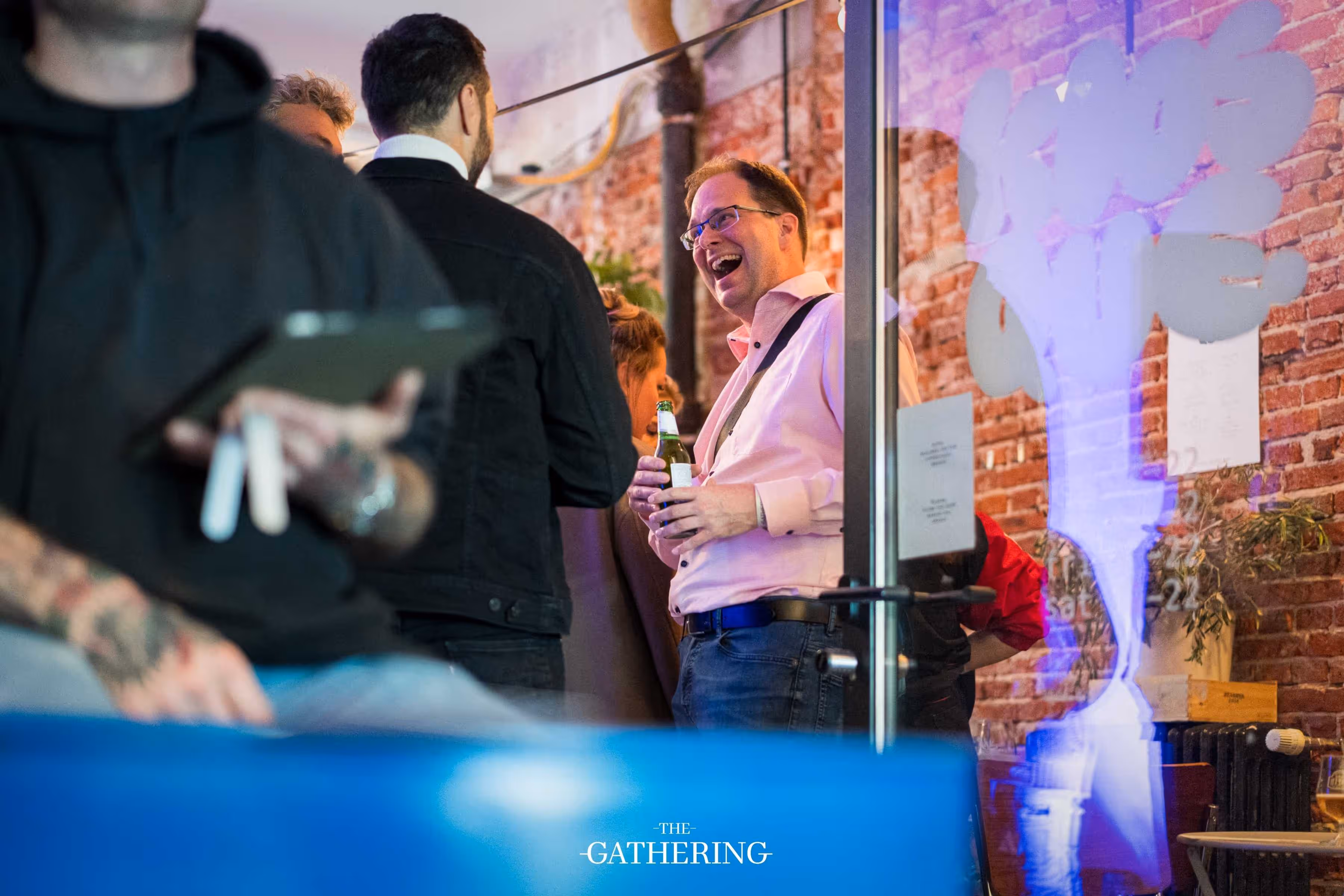Crowd mingling with drinks at The Gathering hosted by Maison ACME