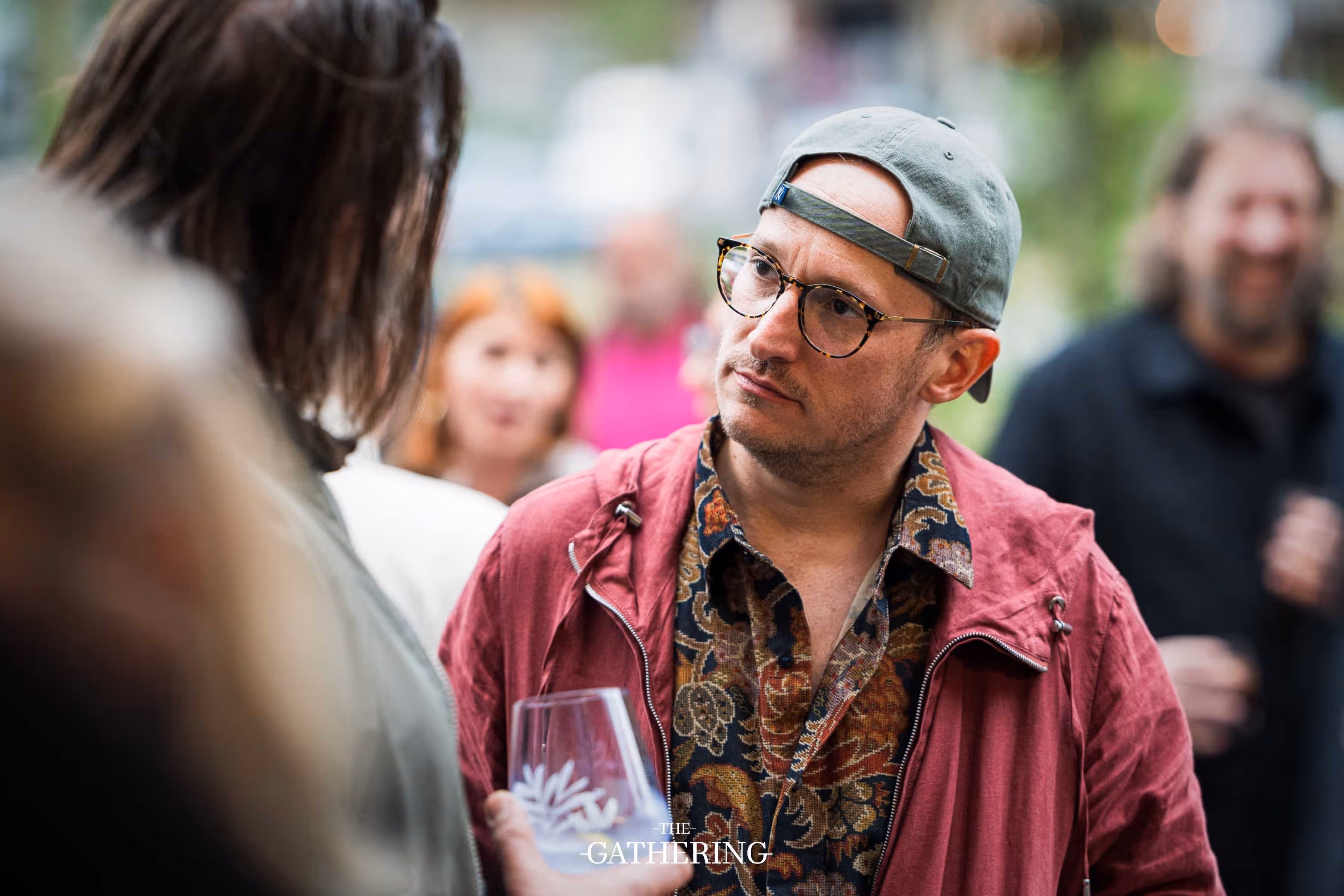Crowd mingling with drinks at The Gathering hosted by Maison ACME