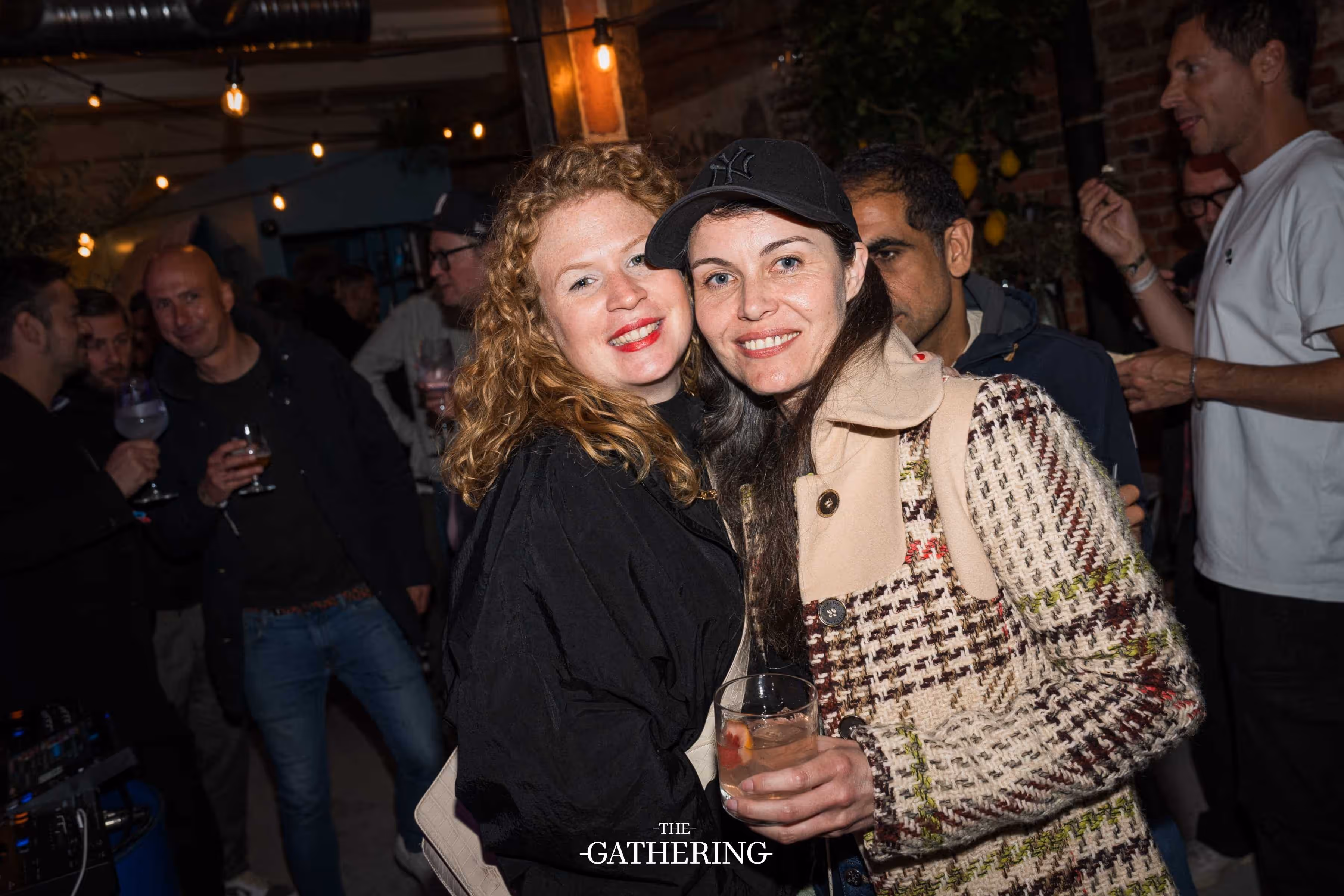 Crowd mingling with drinks at The Gathering hosted by Maison ACME