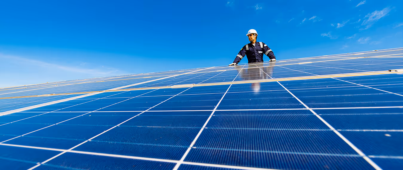 A inspector is using AI technology to better detect issues on solar panels