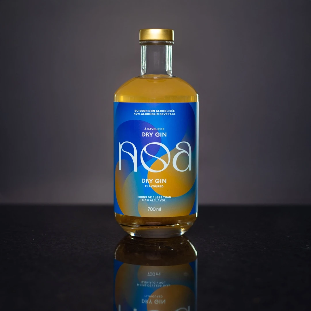 700 ml Bottle of non-alcoholic NOA Dry gin on a dark background