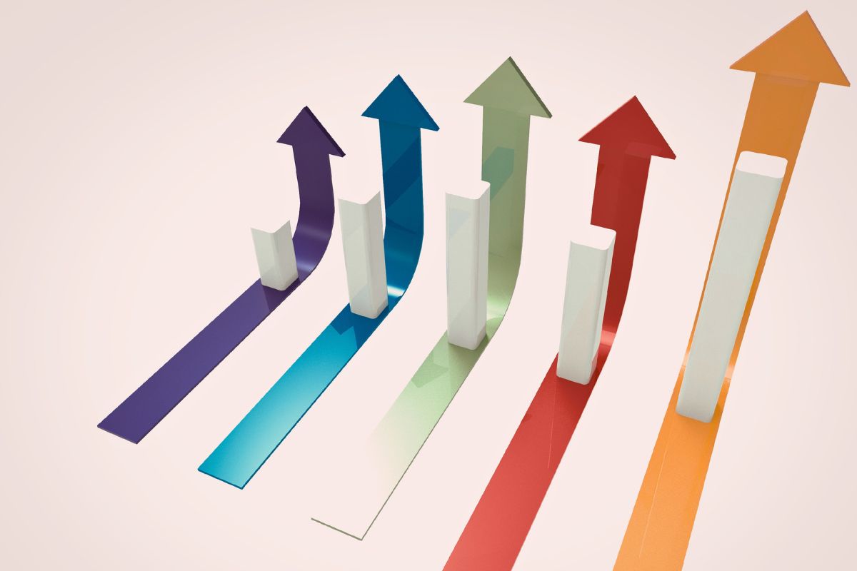 a group of growing success metrics represented as arrows in different colors