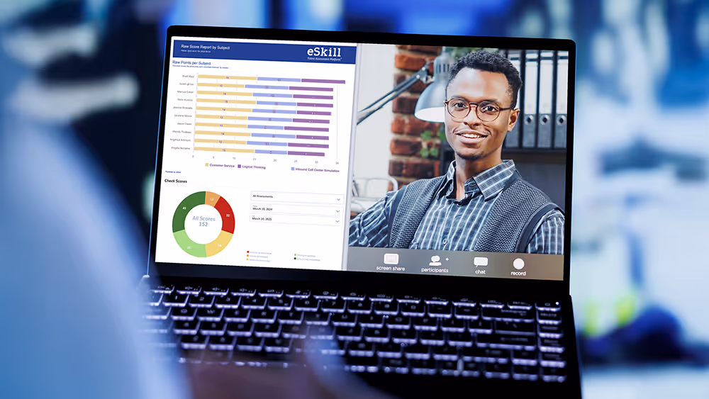 Laptop showing eSkill's Raw Score Report by Subject report on left side of screen and a video chat on the right side