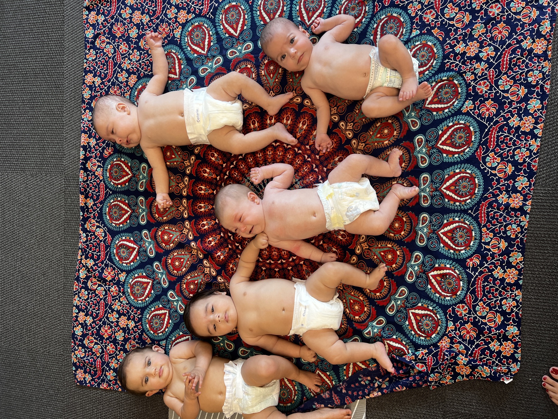 Infants together during a Guiding Growth massage class
