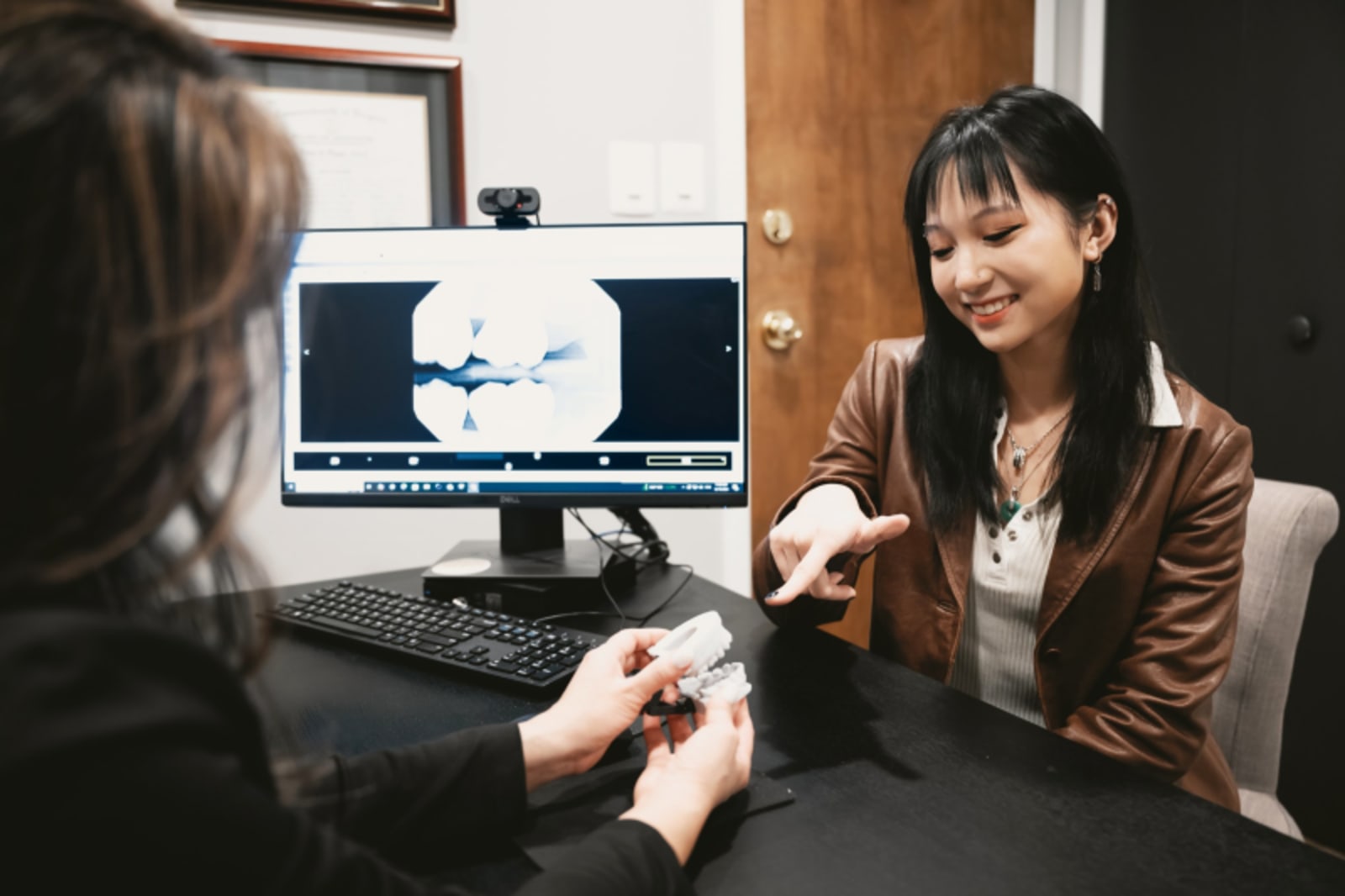 Gum disease and receding gums discussion at Capital Esthetics dental office in Vienna, VA
