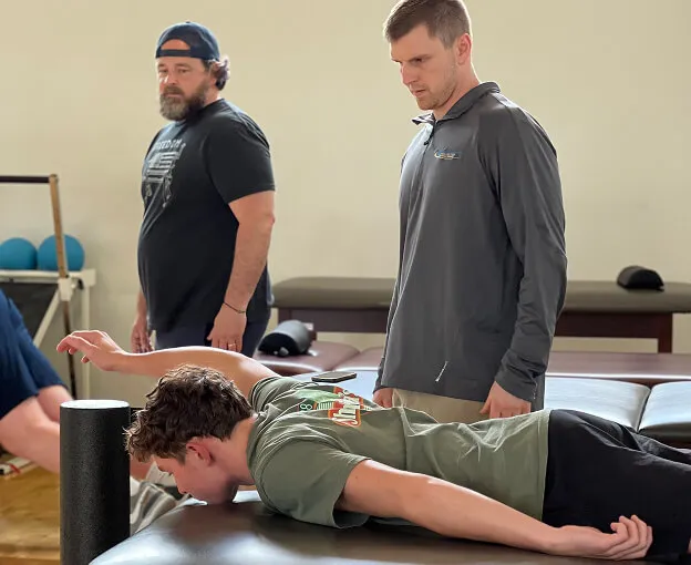 bill assessing client shoulder range of motion - home slider
