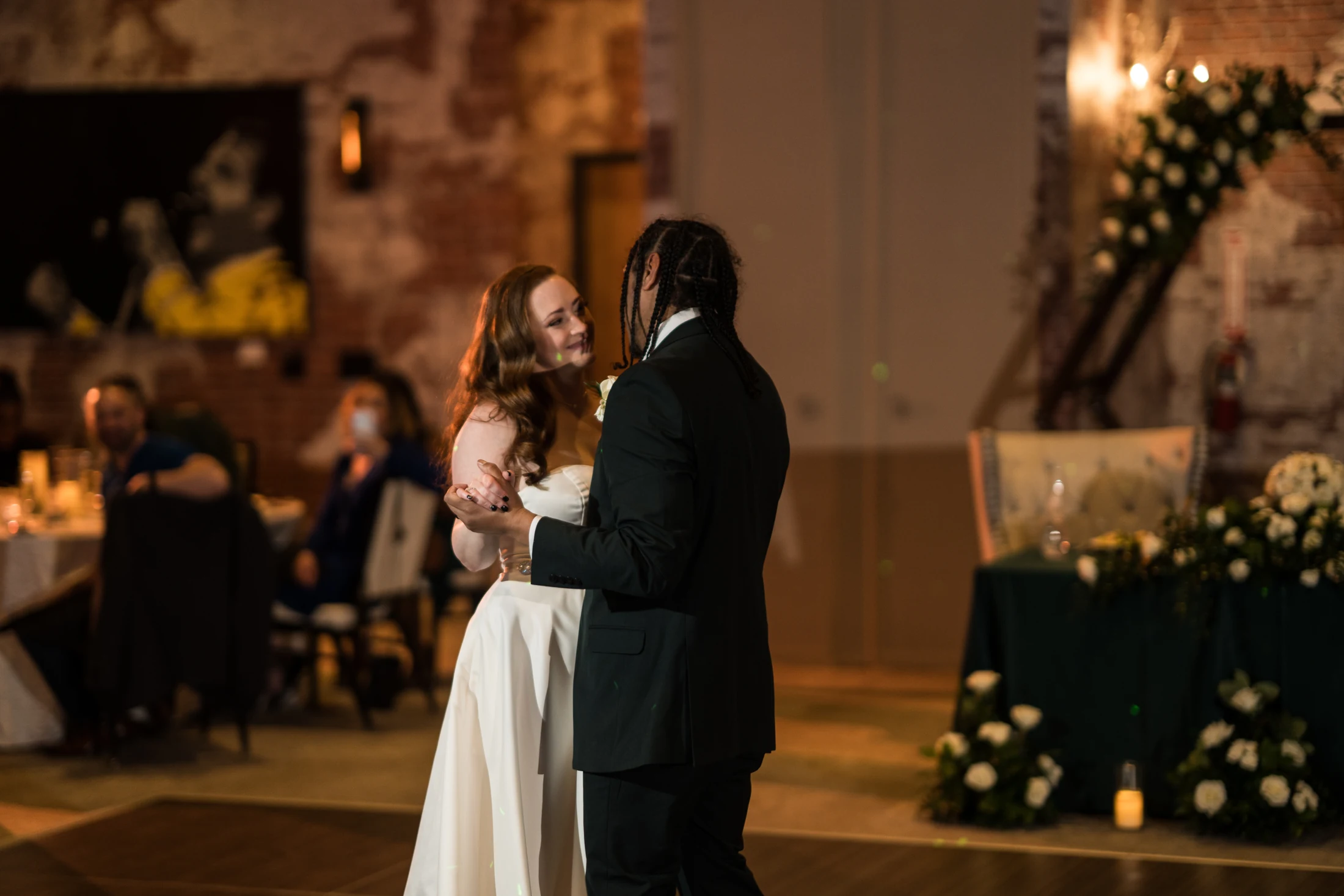 A couple sharing their first dance at a Whitney Peak wedding reception