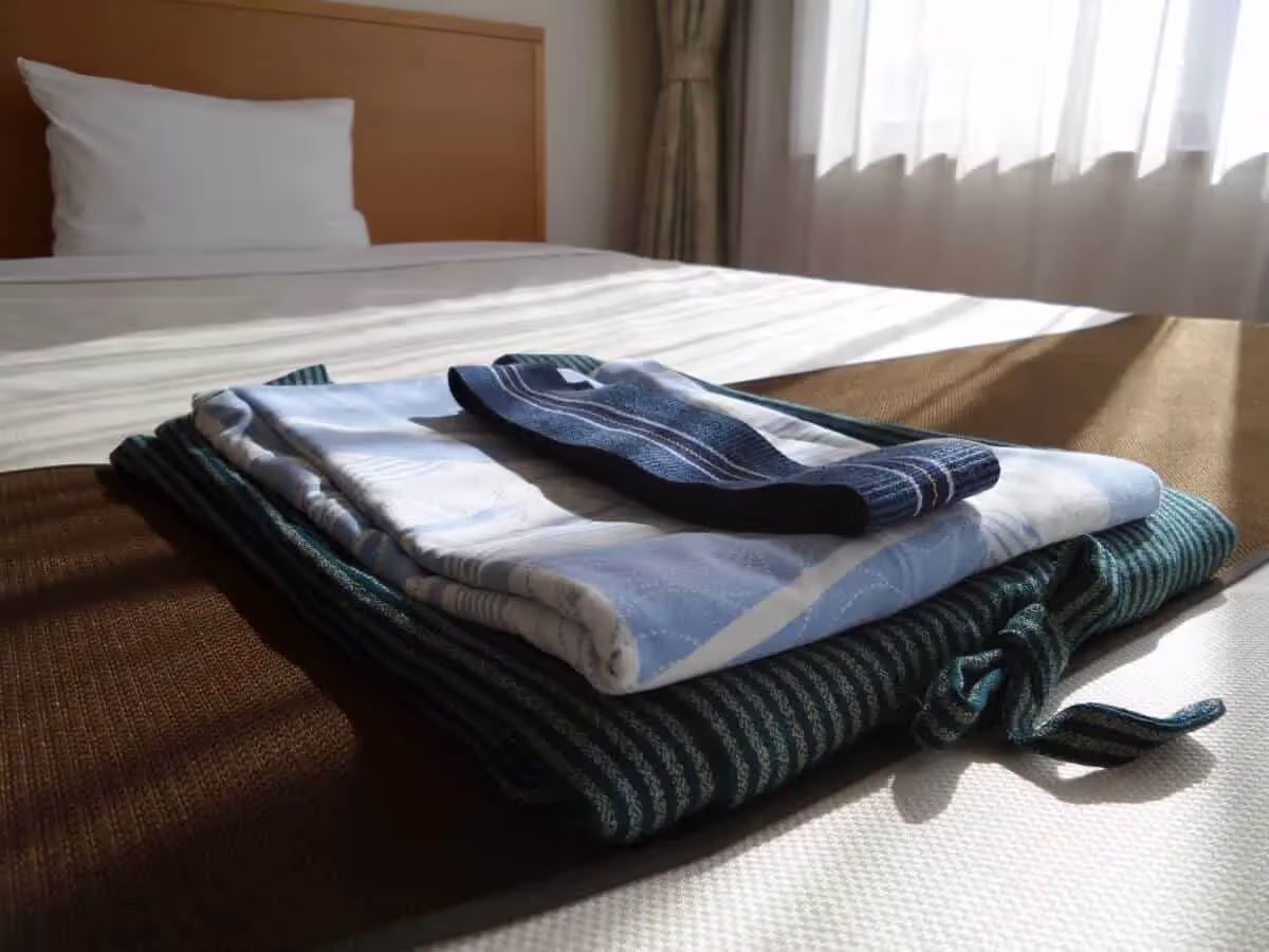 Towels folded on hotel bed
