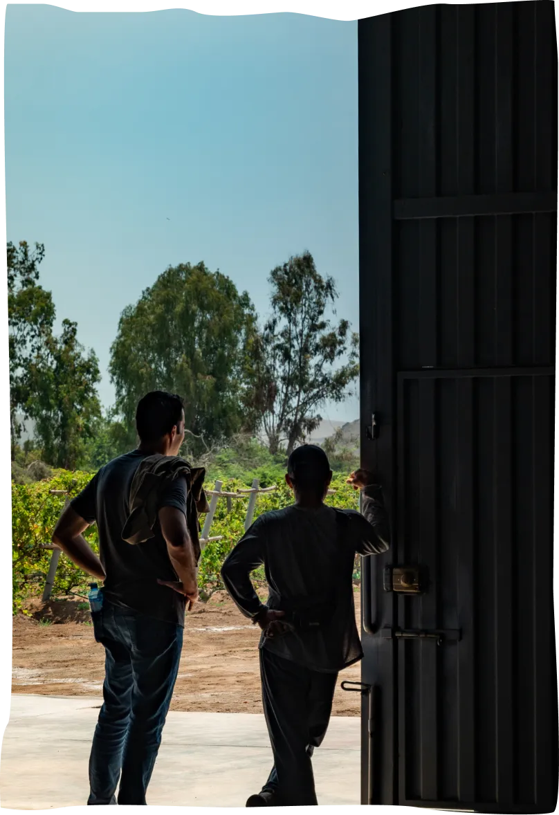 A couple of men standing next to each other.