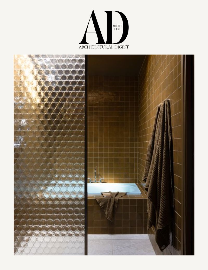 70s inspired modern golden bathroom statement 