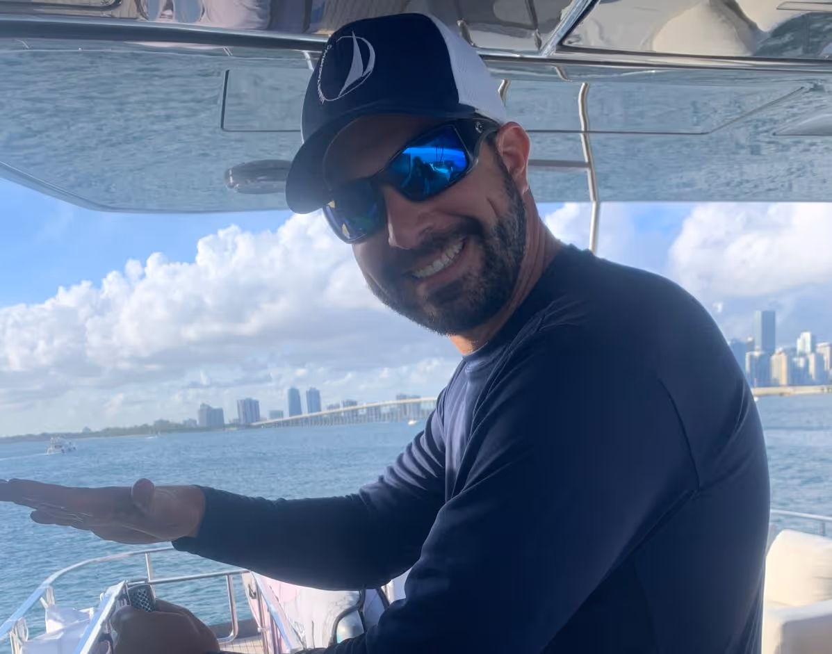 Francisco Martines making dinner on a trip near key biscayne