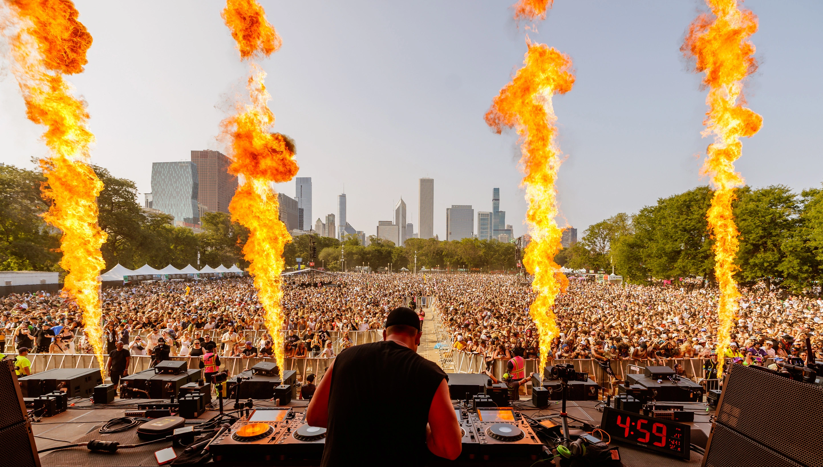 Lollapalooza DJ with big crowd and fire