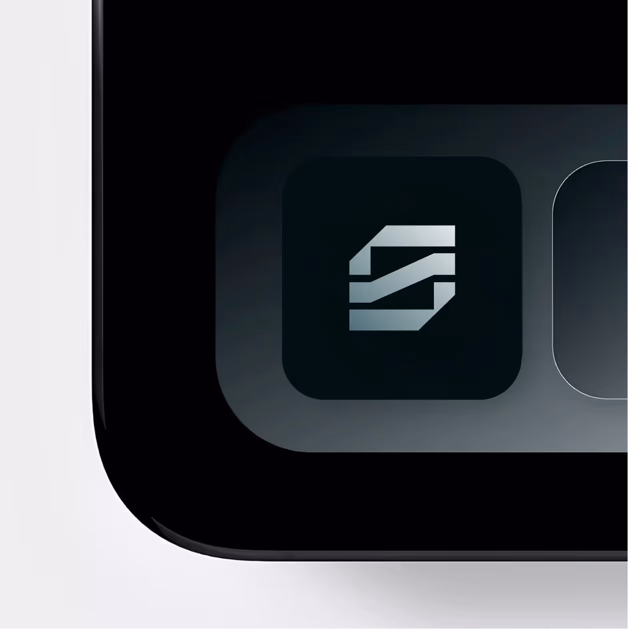 Close-up of a black app icon with the Black Shade logo on a touchscreen device.