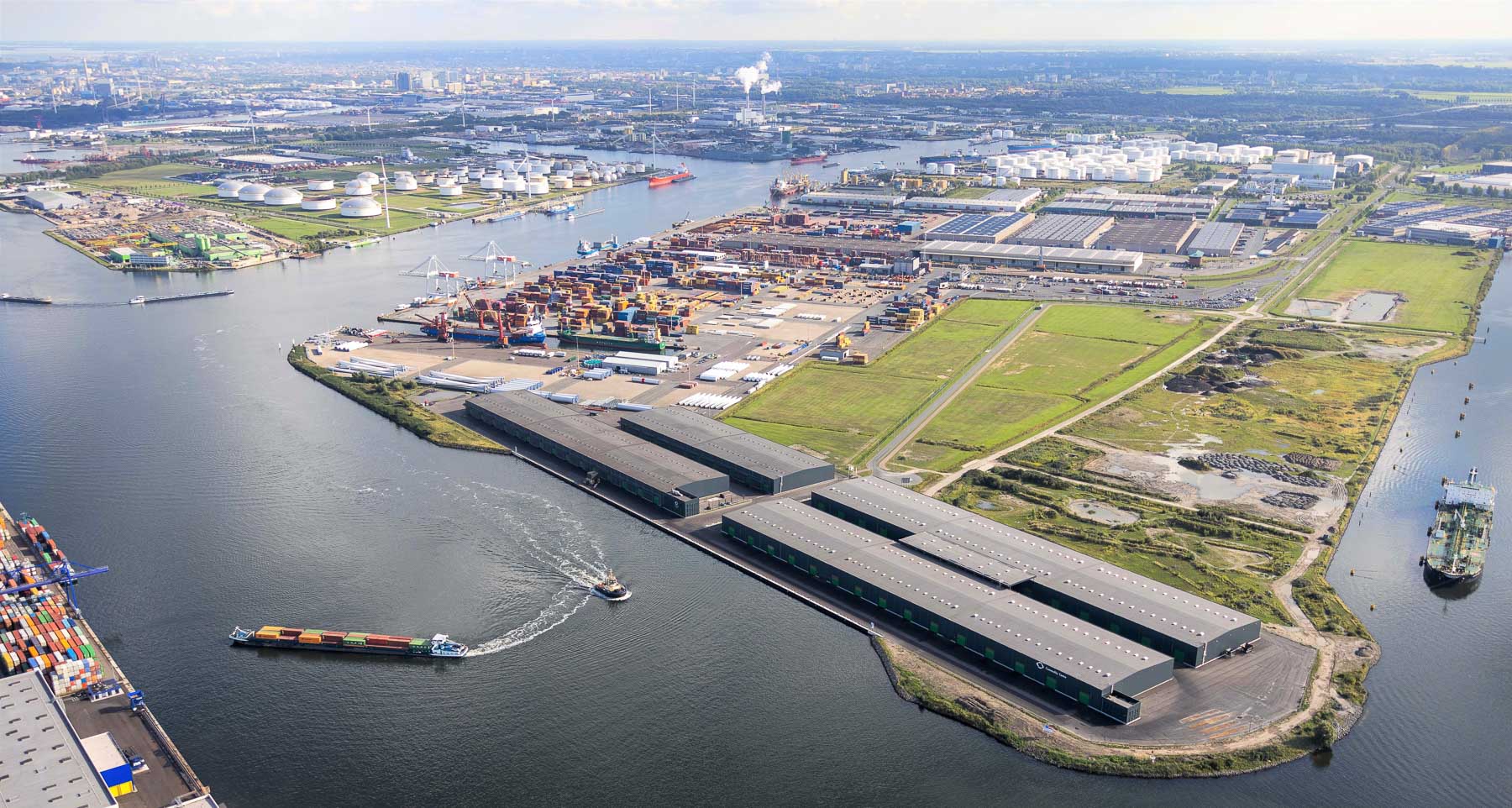 Aerial shot of large warehouses on a peninsula