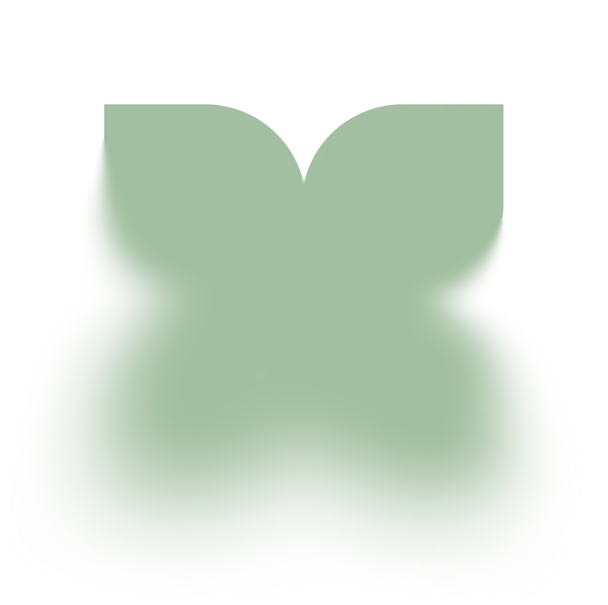 A green pillow with a black background.