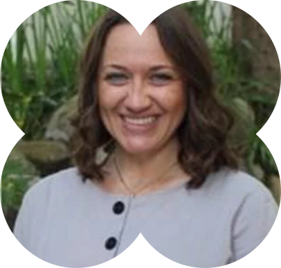 A woman with a smile on her face.